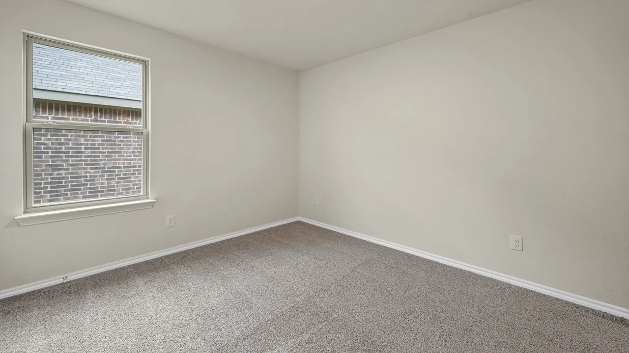 Wall-to-wall carpeting and neutral wall tones