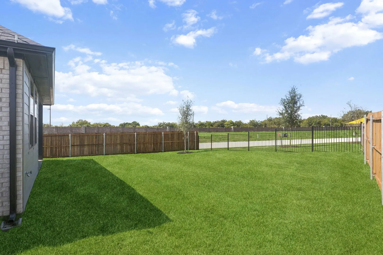 Backyard in the Magnolia home plan – REPRESENTATIVE PHOTO