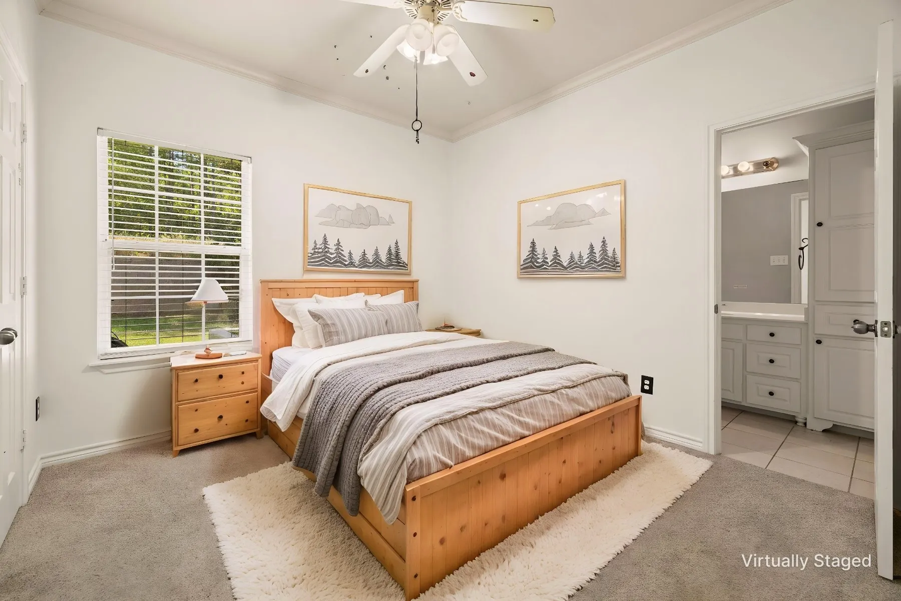 Neutral tone wall paint, crown molding, ceiling fan, carpet flooring, and a window with blinds