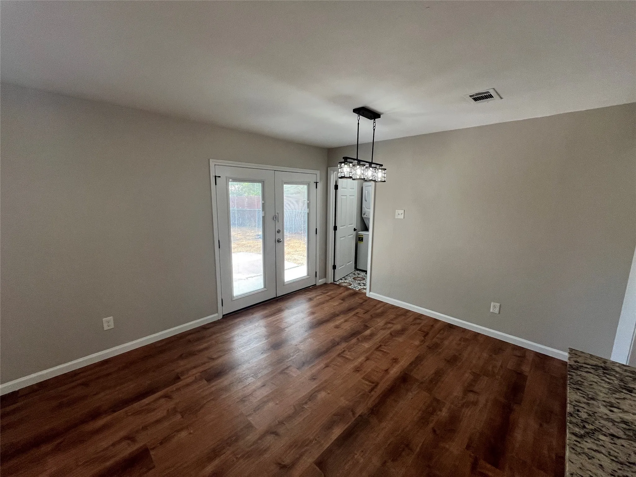 Wood-finish flooring with neutral wall tones