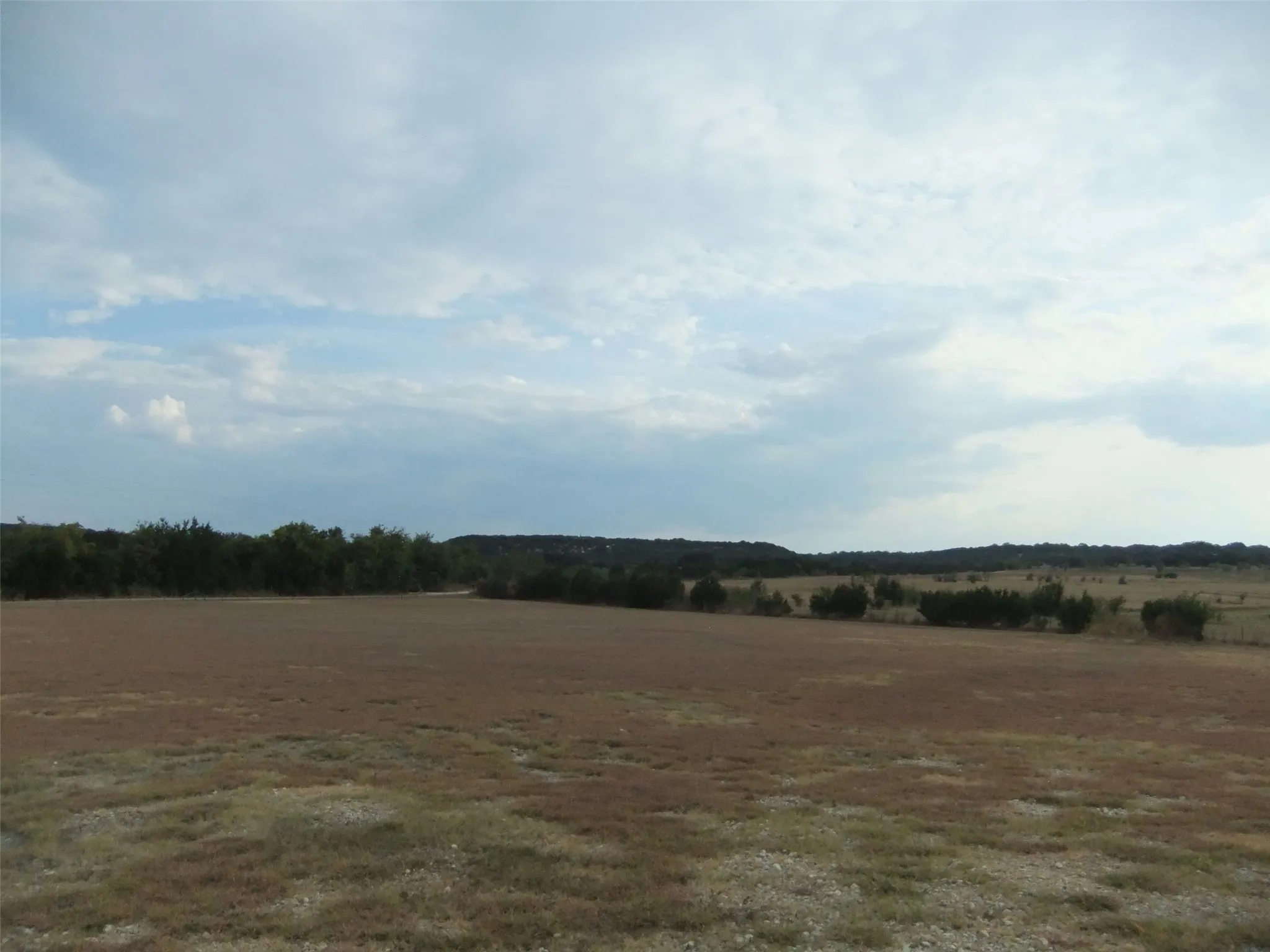 Expansive land parcel with natural terrain