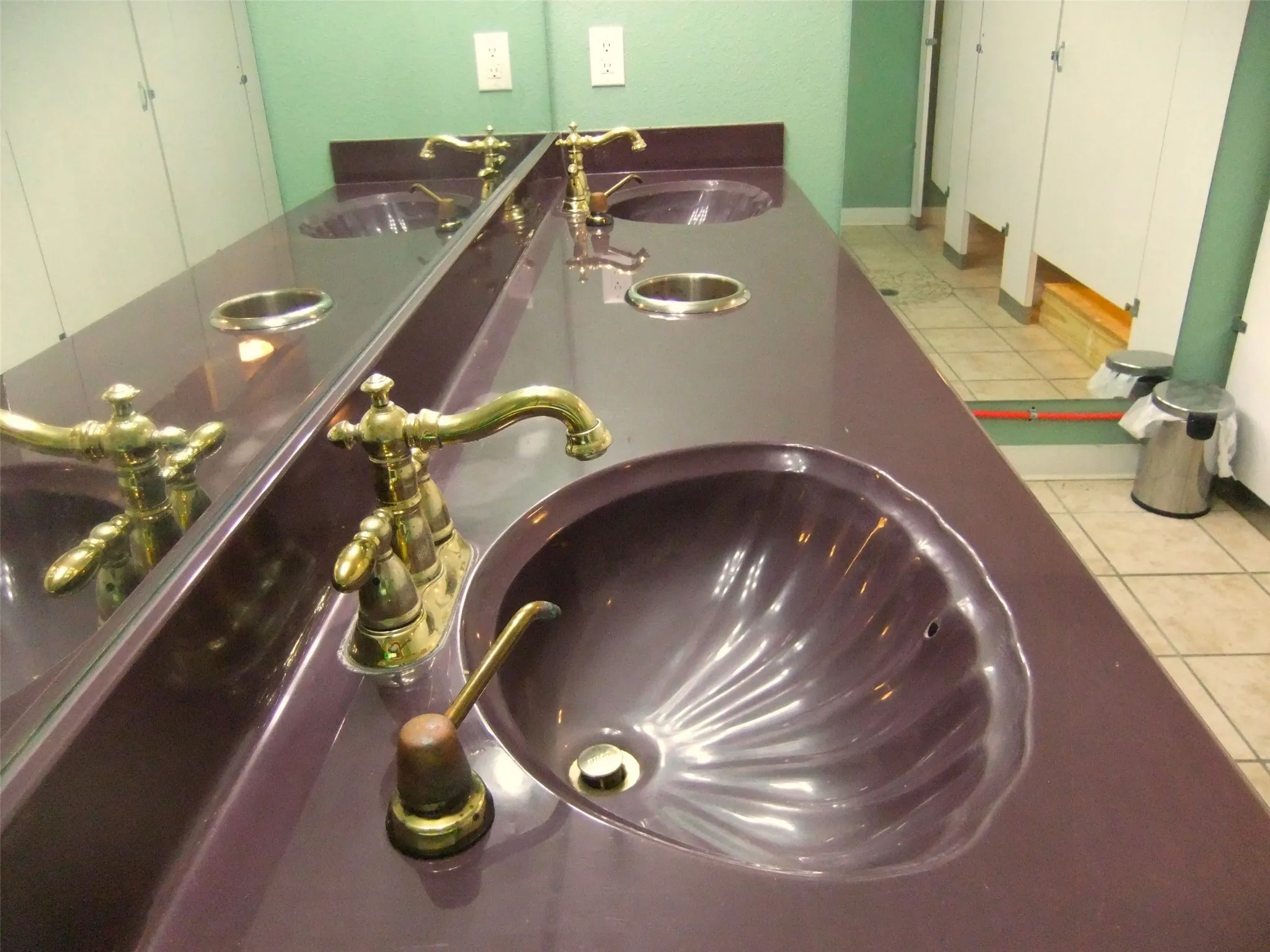Ladies restroom double sinks in long vanity