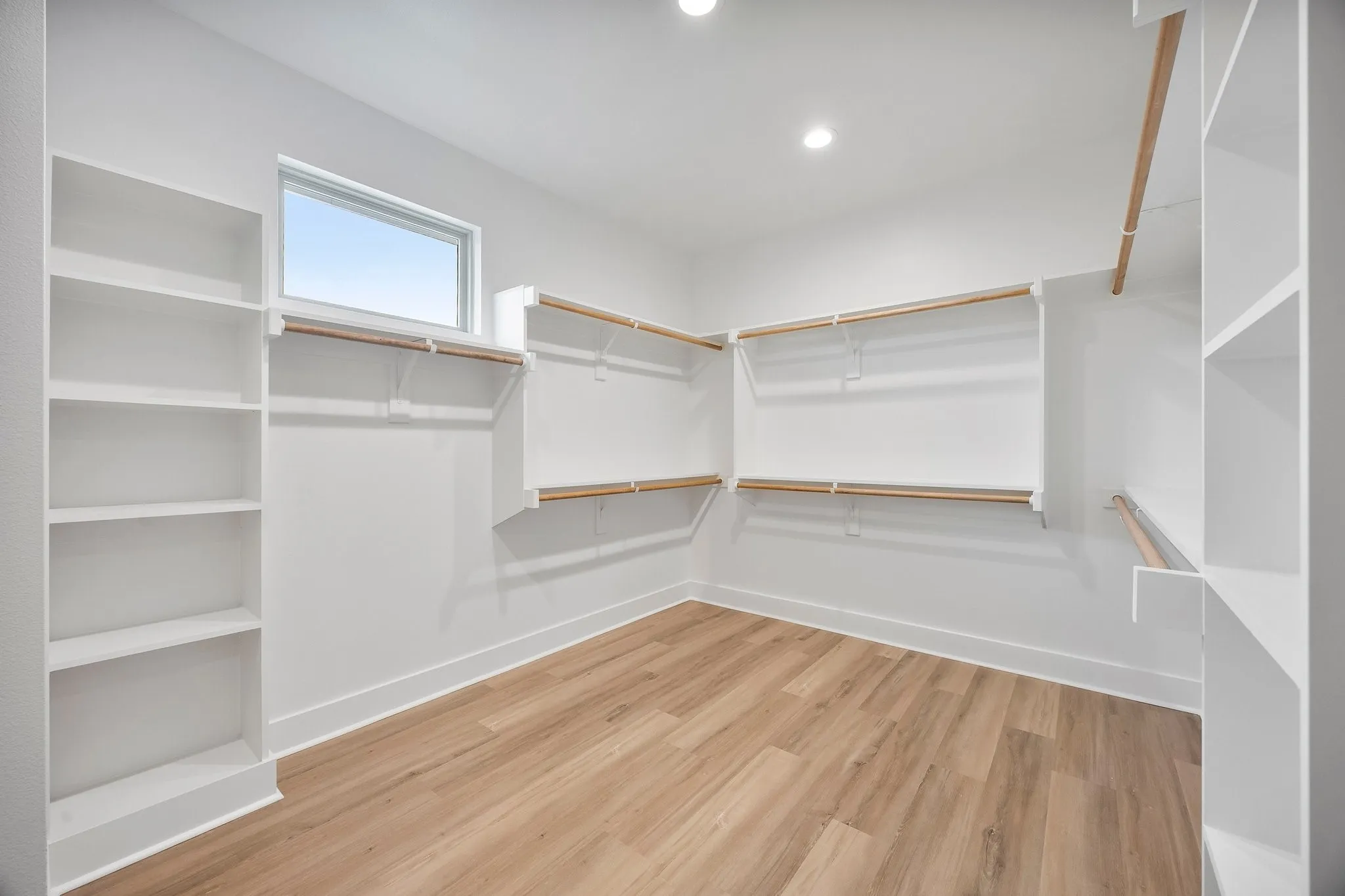 Primary walk-in closet adjoins the primary closet and full size laundry room