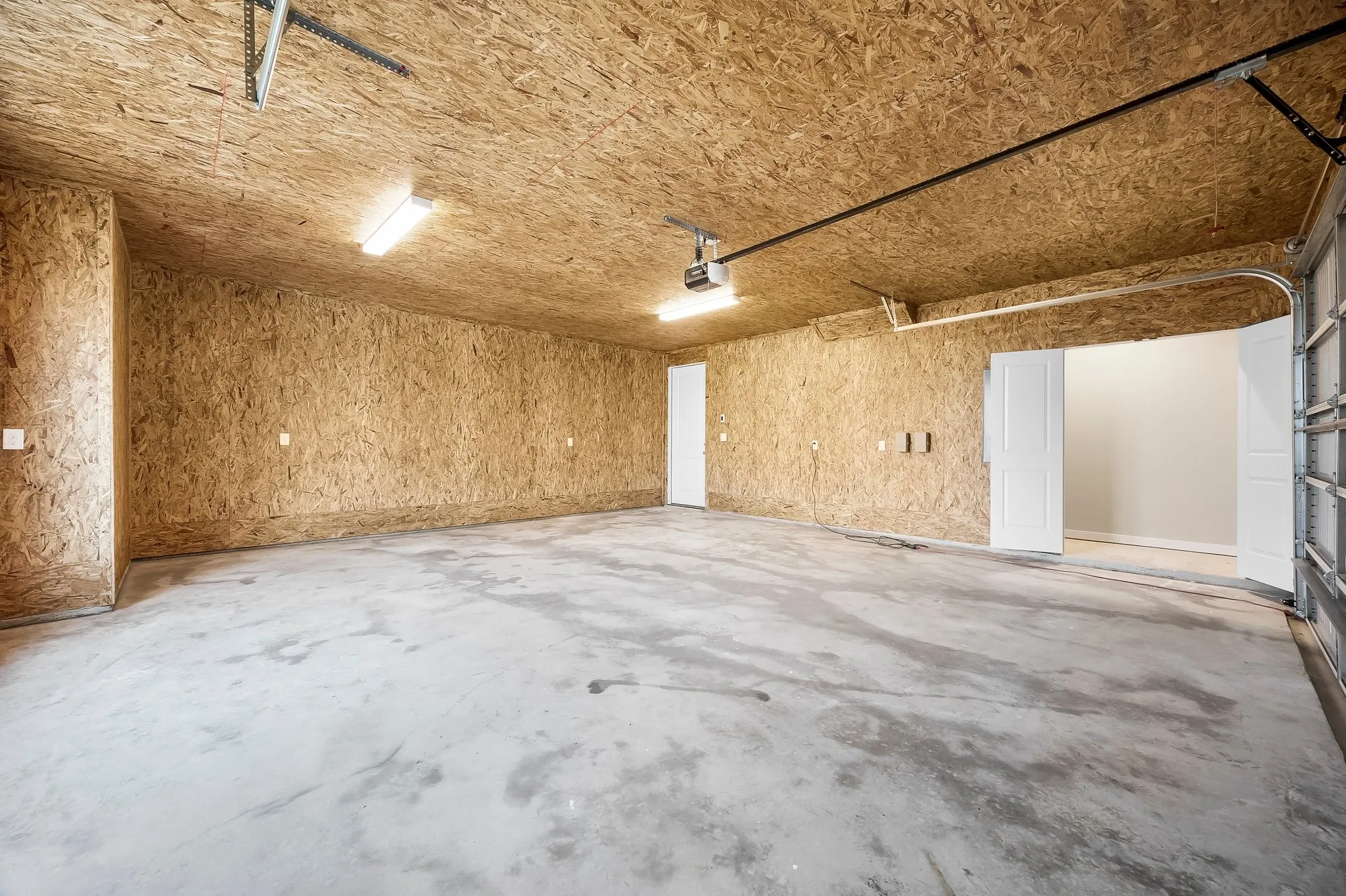 Spacious garage with large closet for extra storage