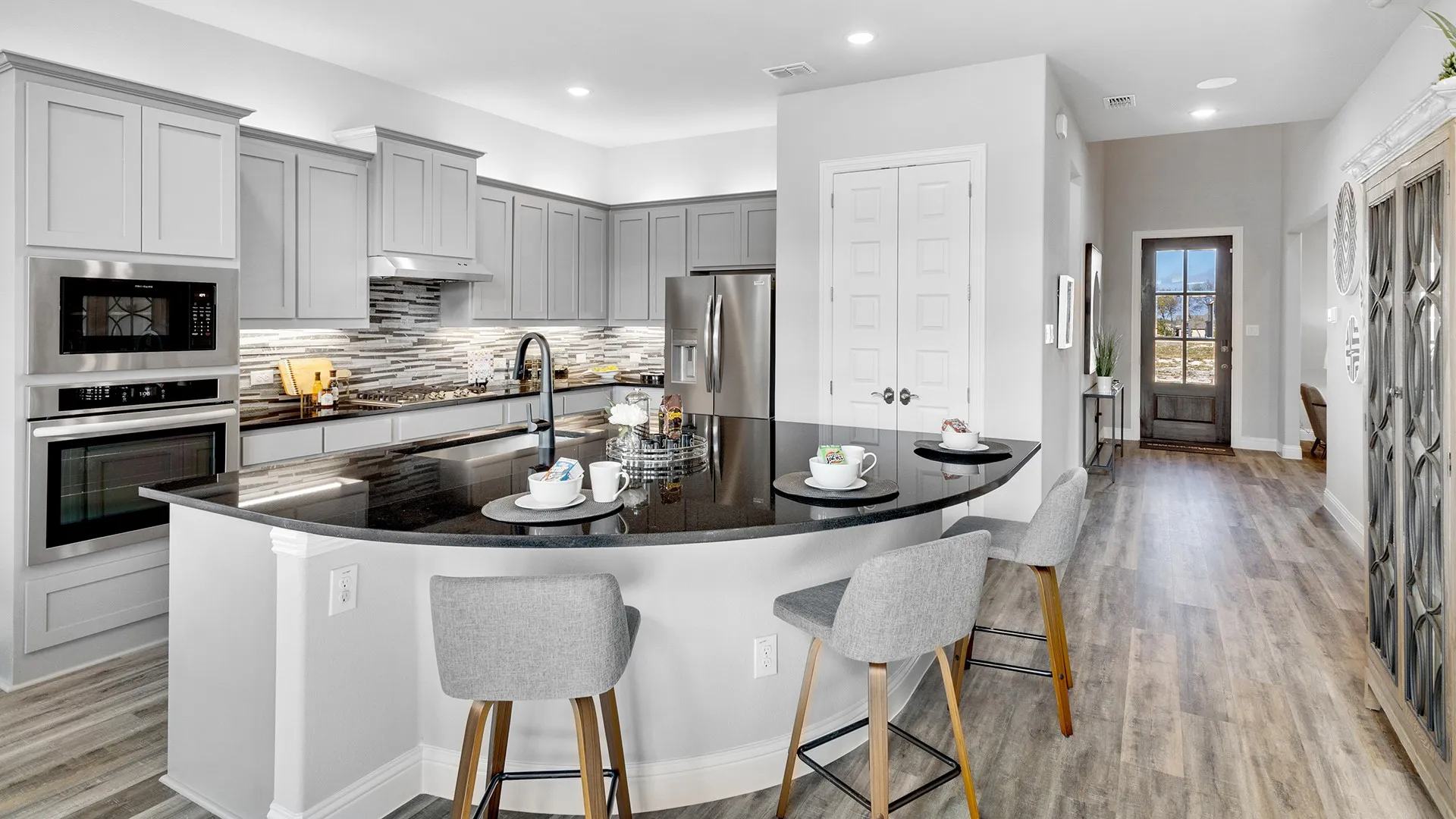 Model home photos of similar floorplans, not pictures of actual home.
