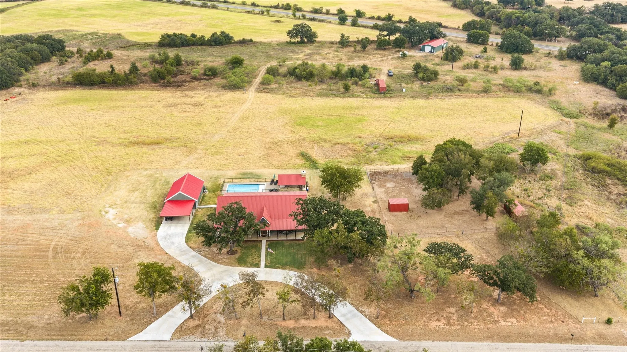 Offering 2 acres with potential for more. Ask agent for details.