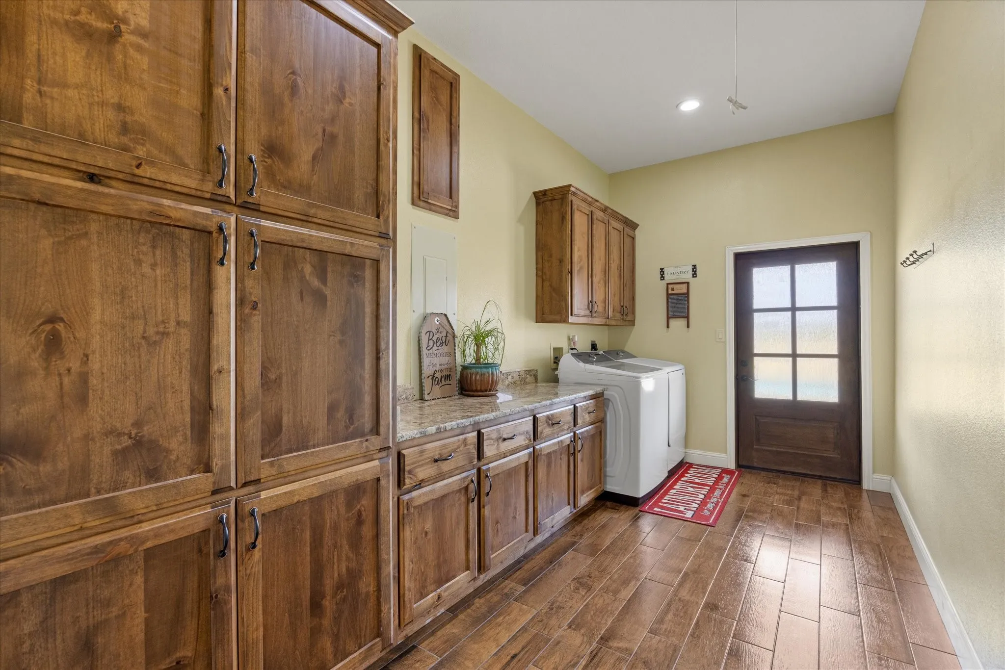 Large laundry room with more storage.