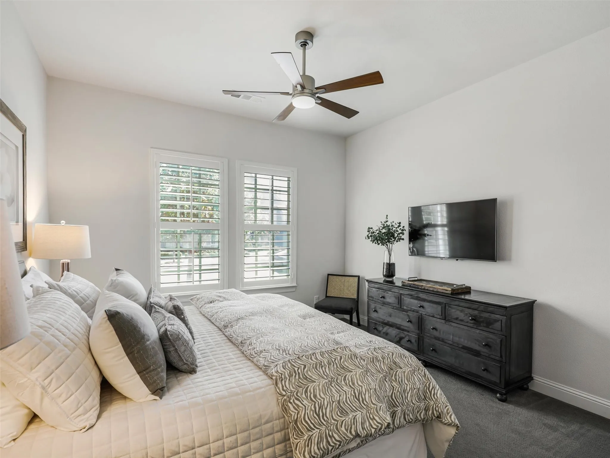 Also located downstairs is a private secondary bedroom suite complete with its own ensuite bath and spacious walk-in closet-ideal for guests, extended family, or multigenerational living.