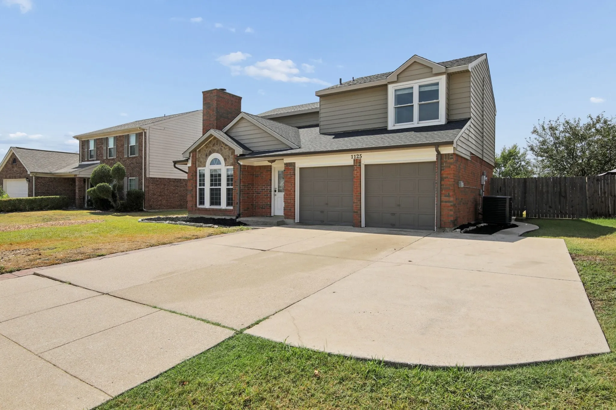 With an oversized driveway, there are plenty of parking spaces!