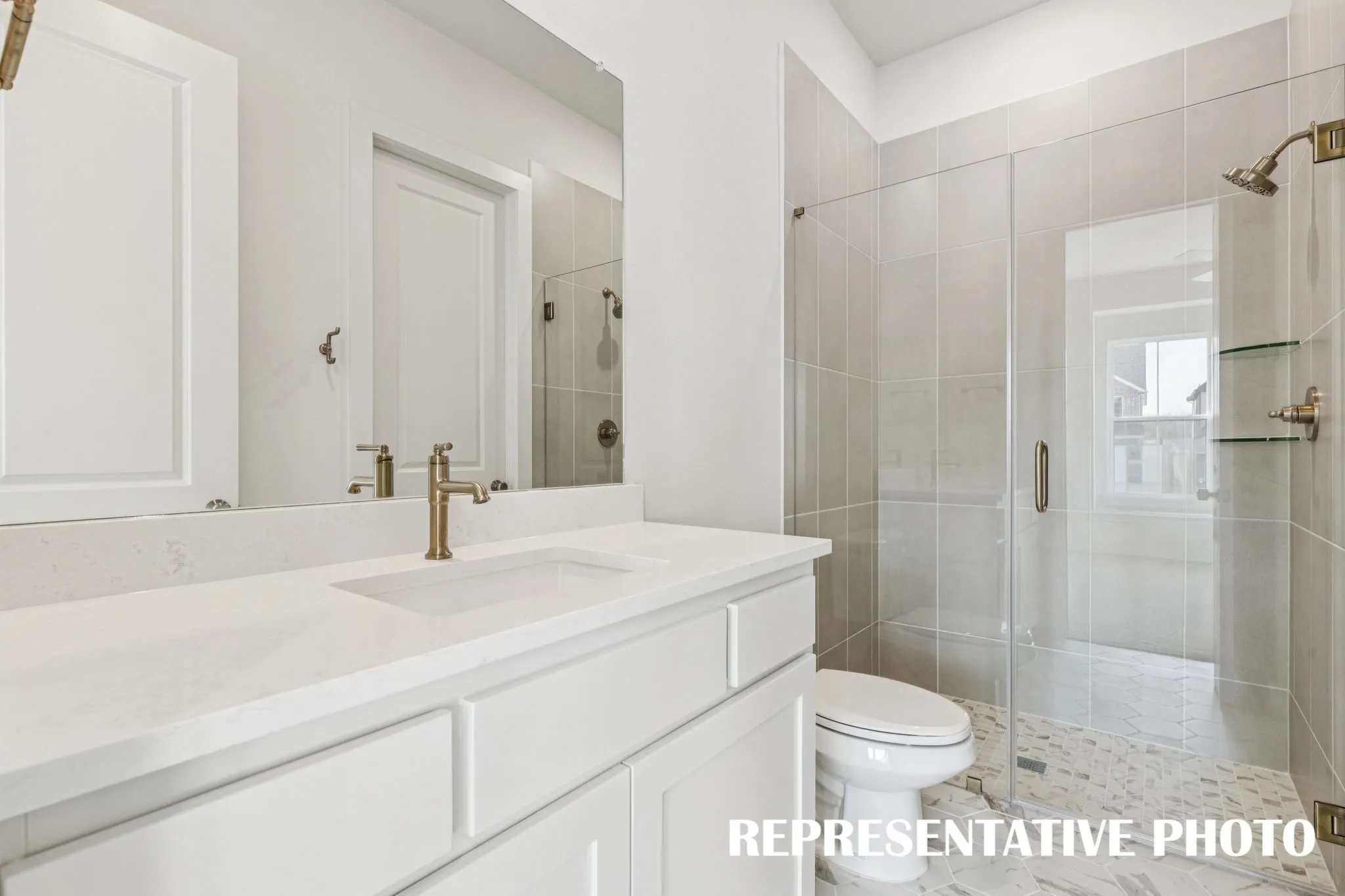 Friends and family will feel right at home in any of the beautifully finished guest baths that our Addison III plan offers.  REPRESENTATIVE PHOTO