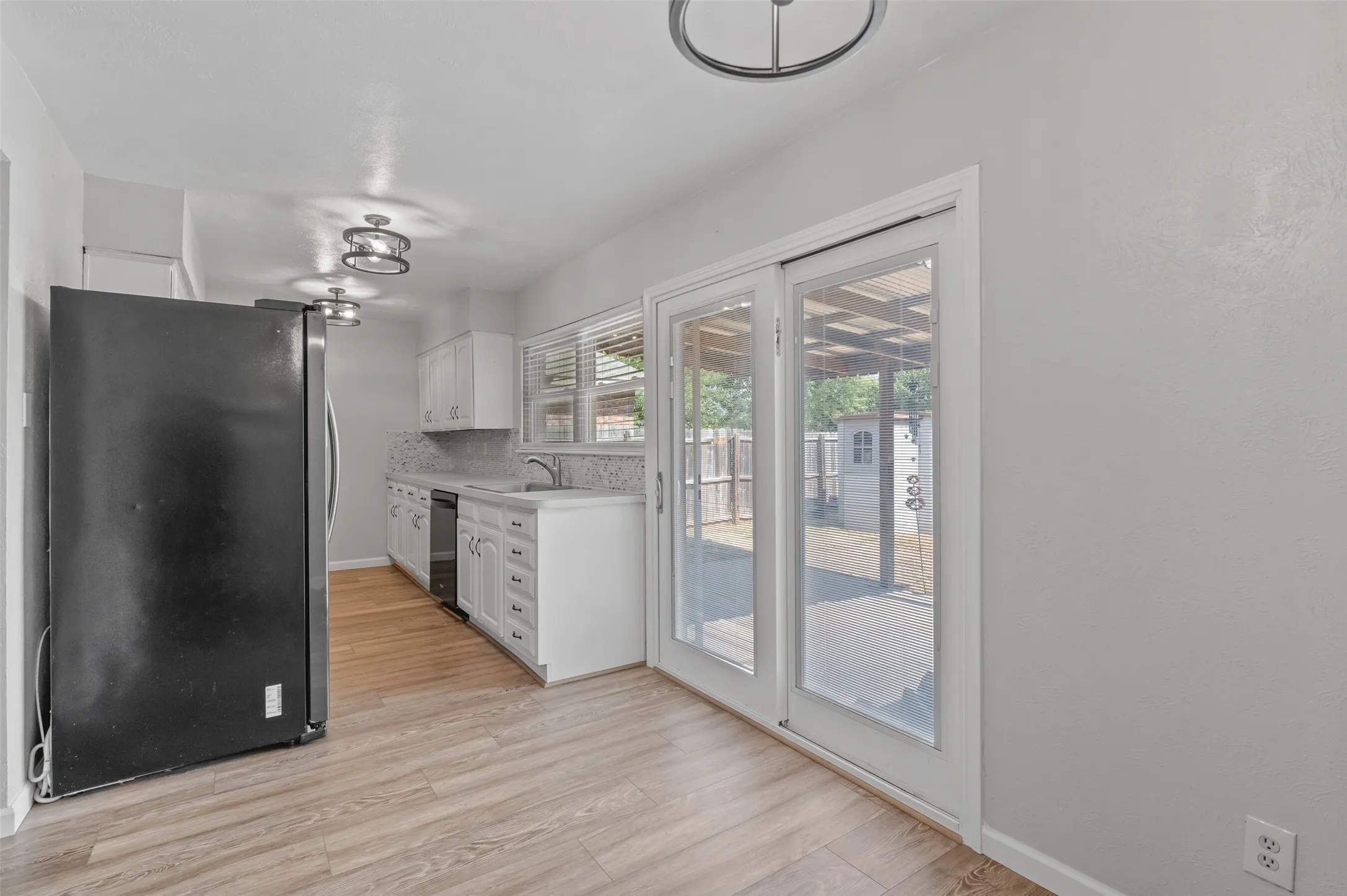 Galley kitchen and patio access