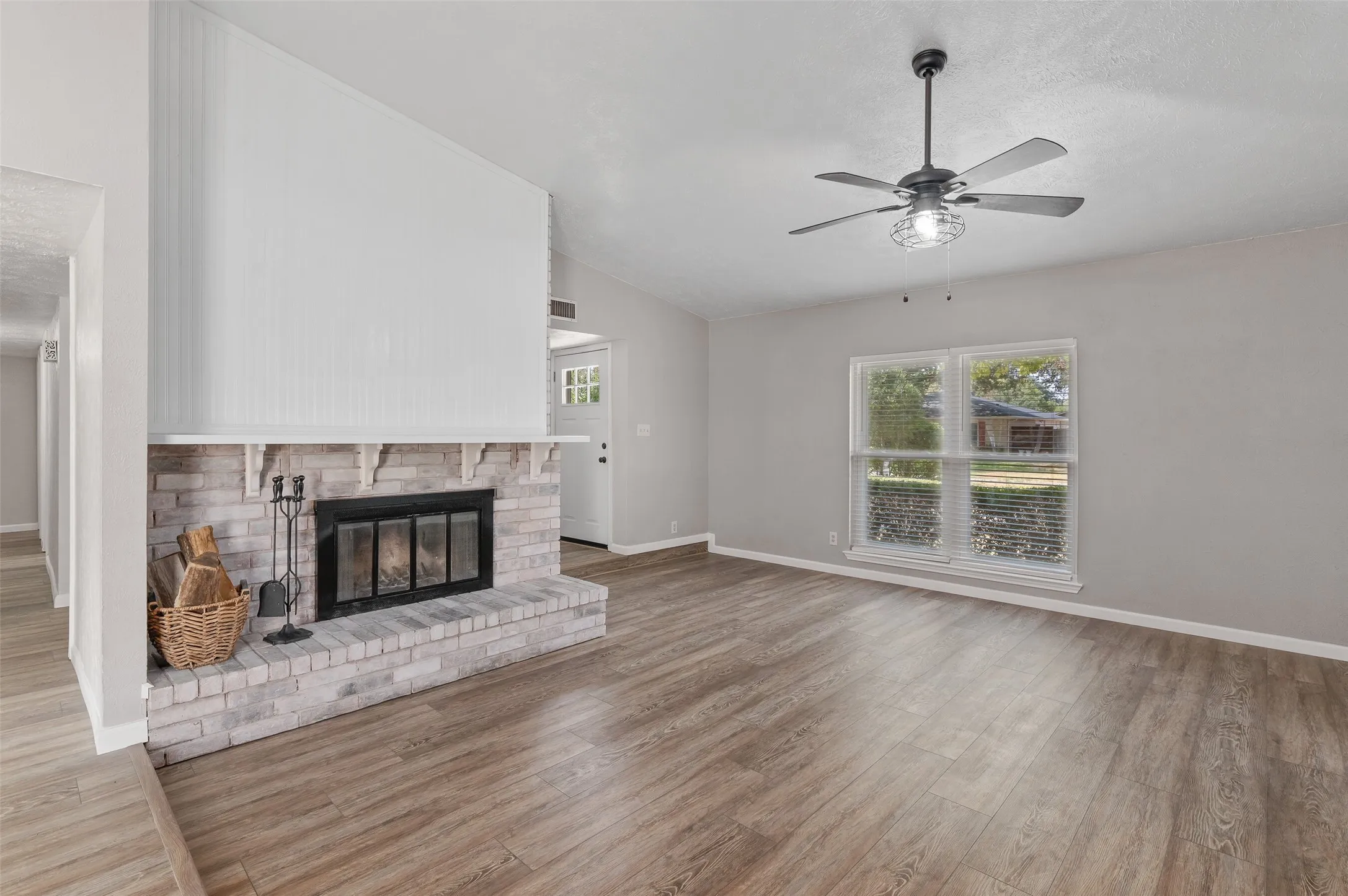Living area with wood burning fireplace