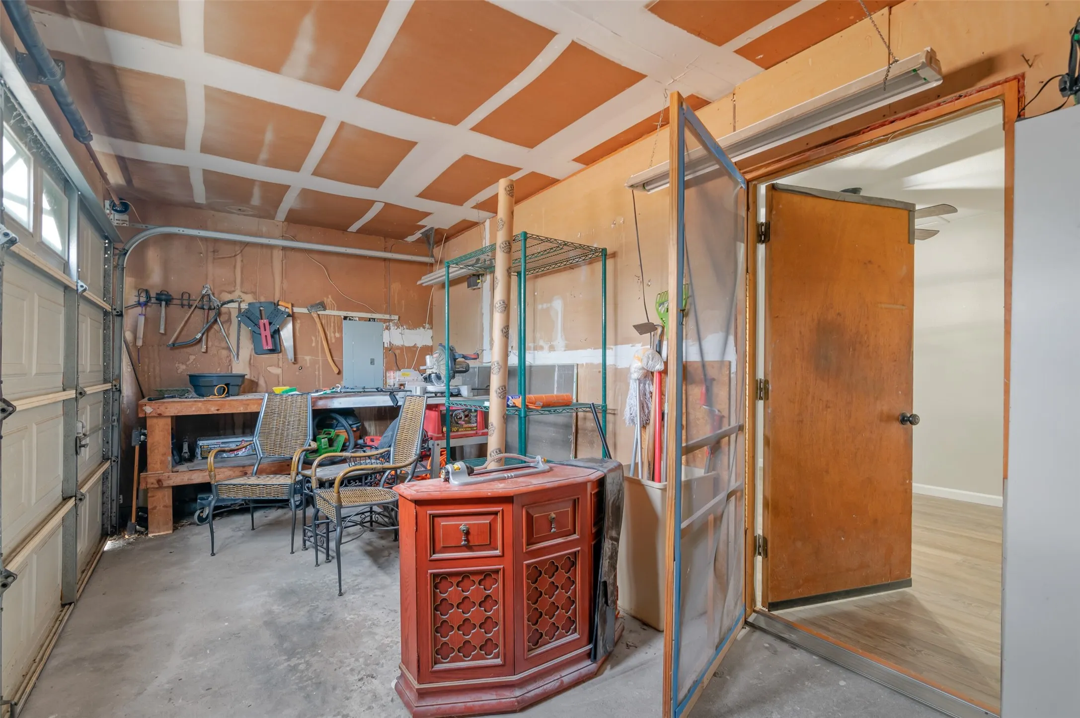 Part of garage converted to bonus room, this is the remaining storage area.