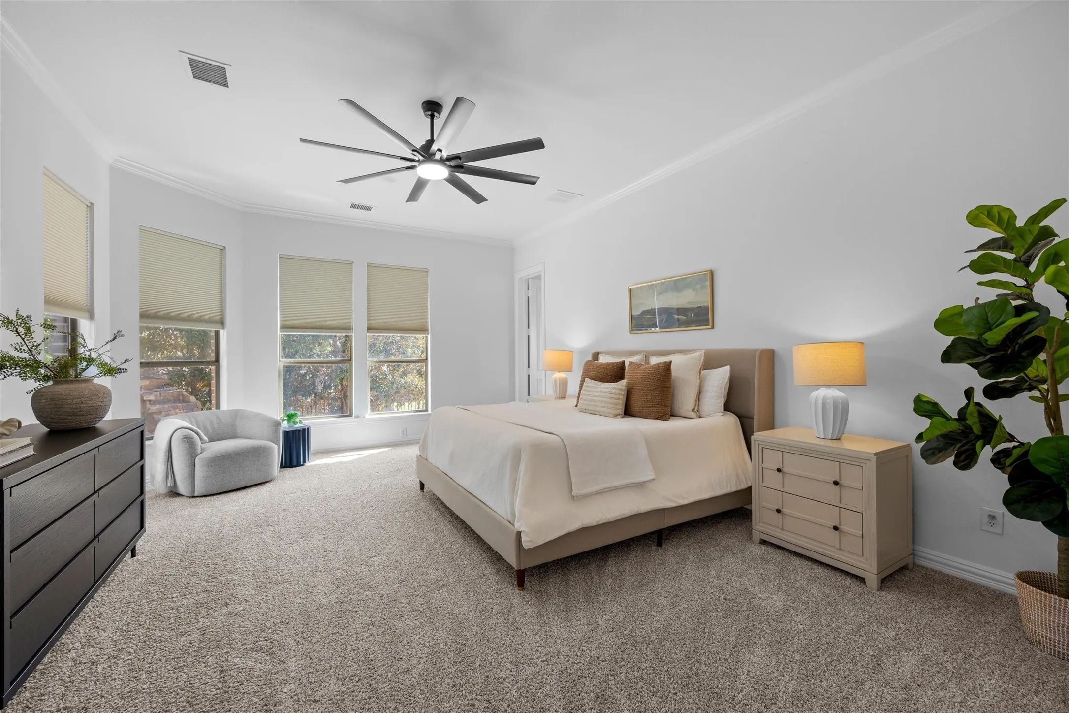 The master is nicely placed at the back of the home for privacy and a view of the backyard and greenspace.