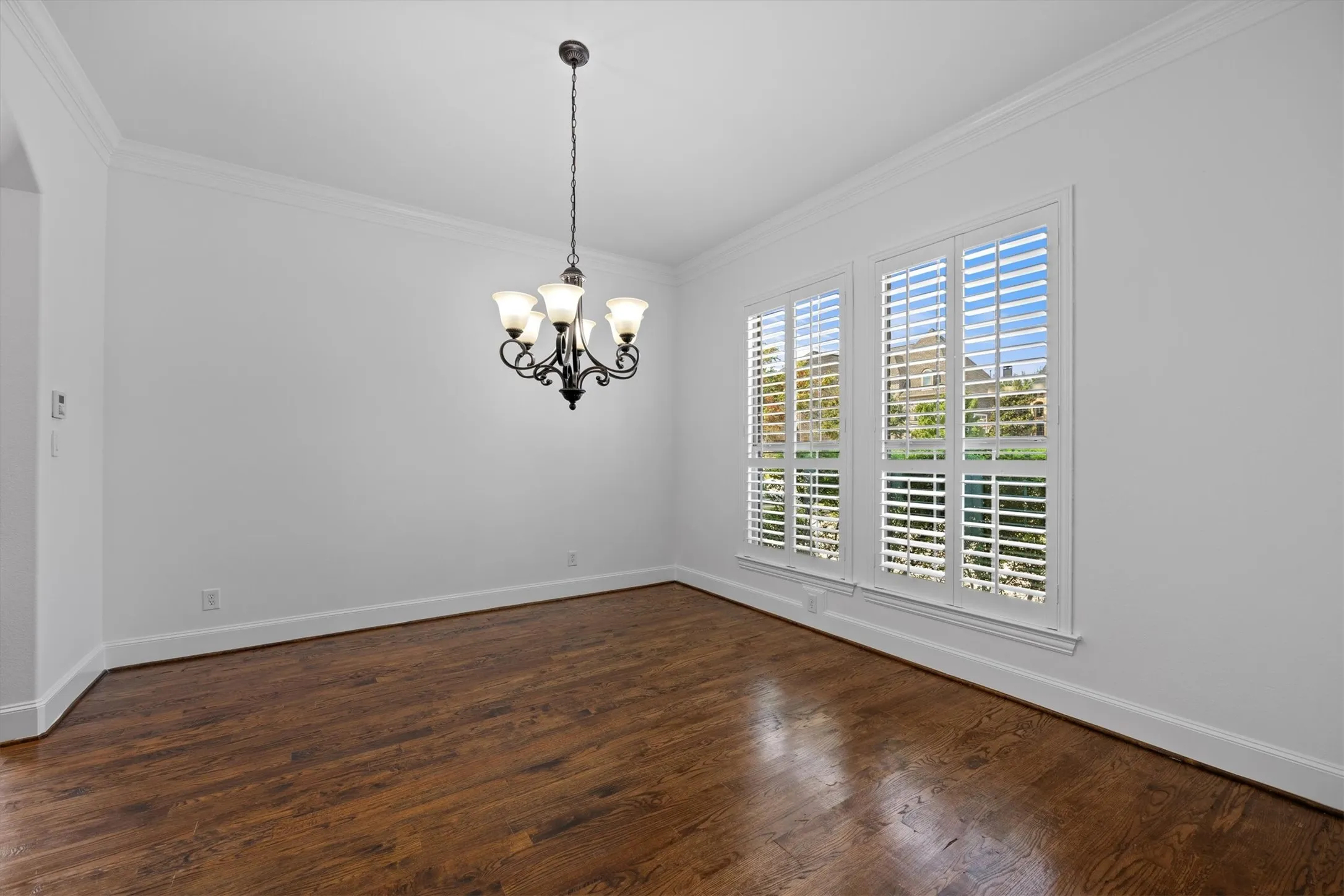 The dining room is conveniently located off the kitchen with the natural light shining through the front window!