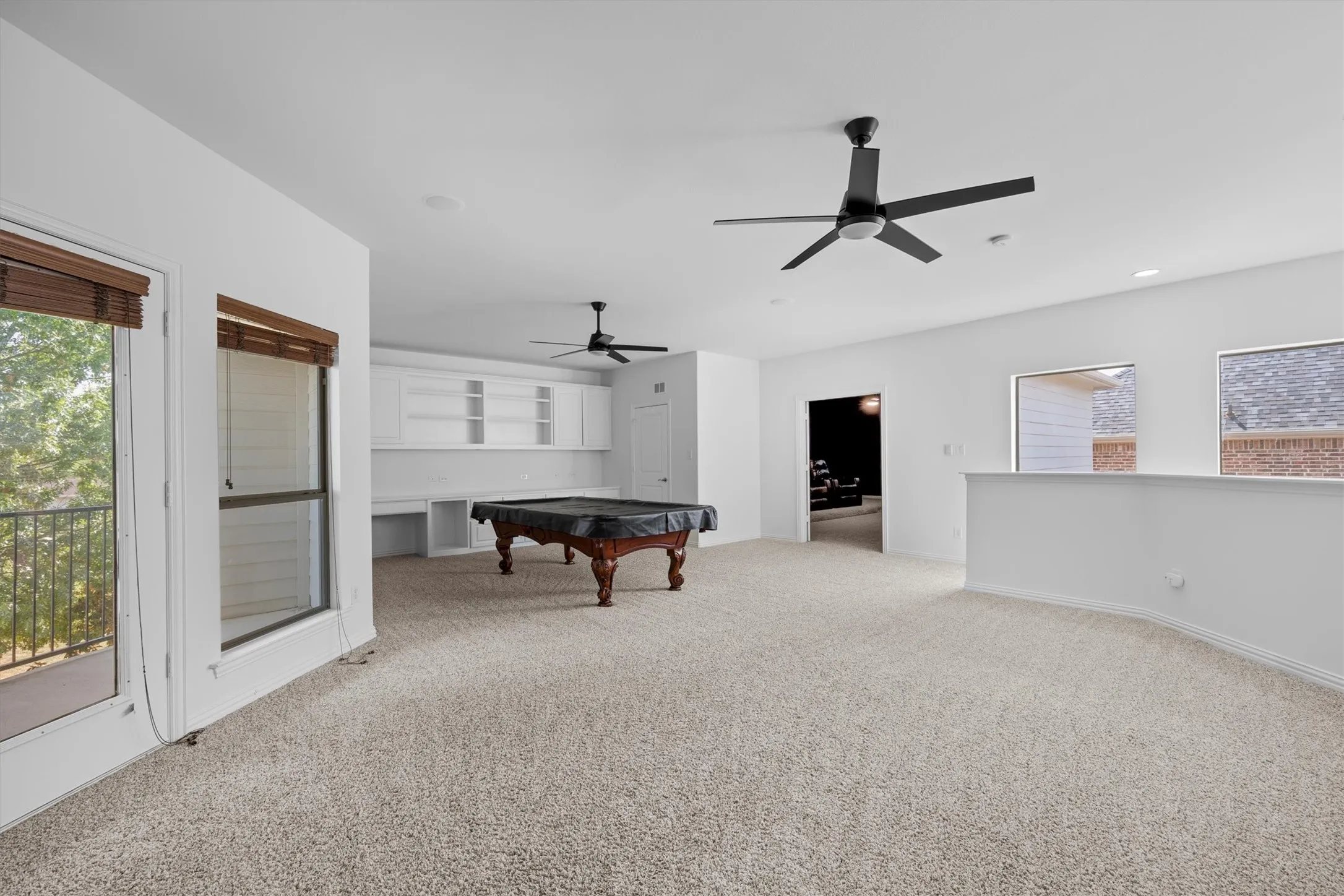 Large game room offers space for a pool table and then some!