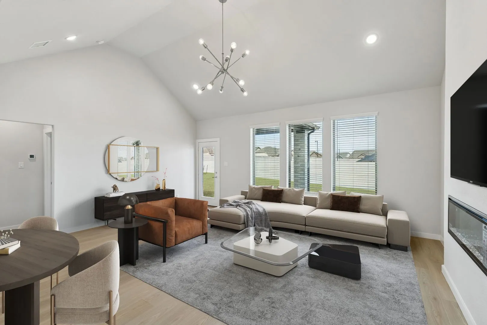 Dining and Living Room in the Stanley II home plan – REPRESENTATIVE PHO