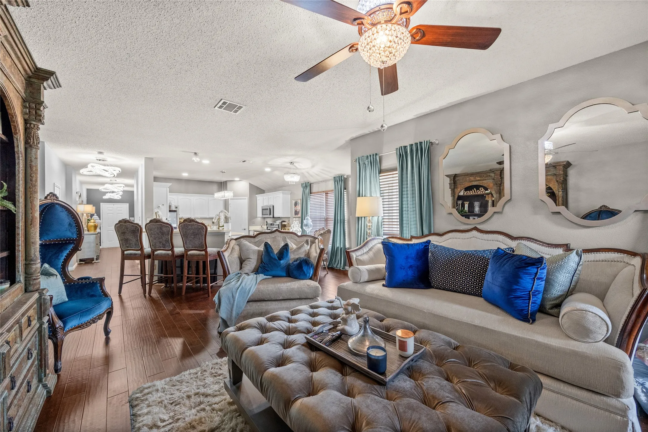 OPEN VIEW FROM FAMILY ROOM INTO KITCHEN