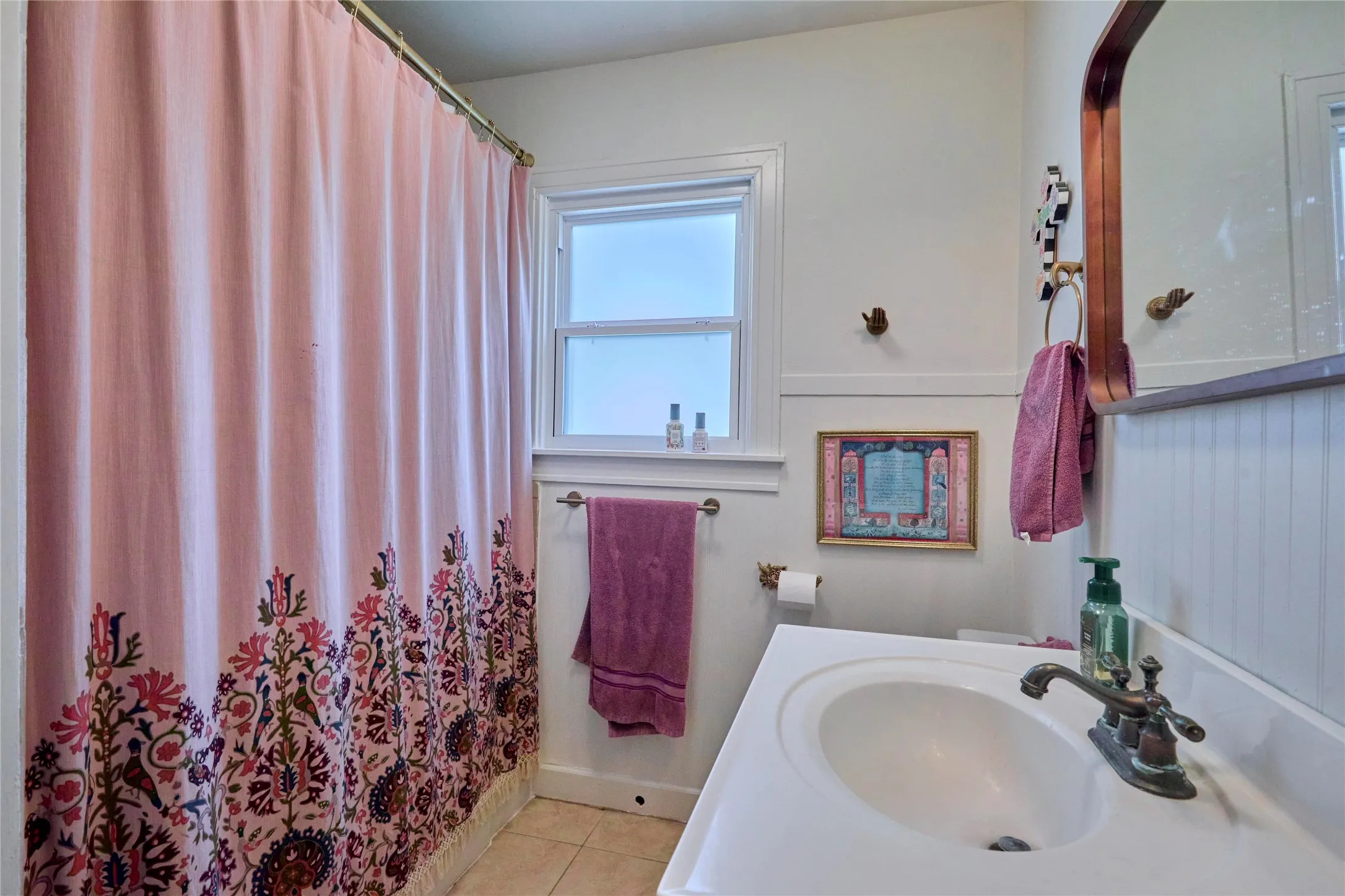 Single vanity with integrated sink and classic bronze-tone faucet
