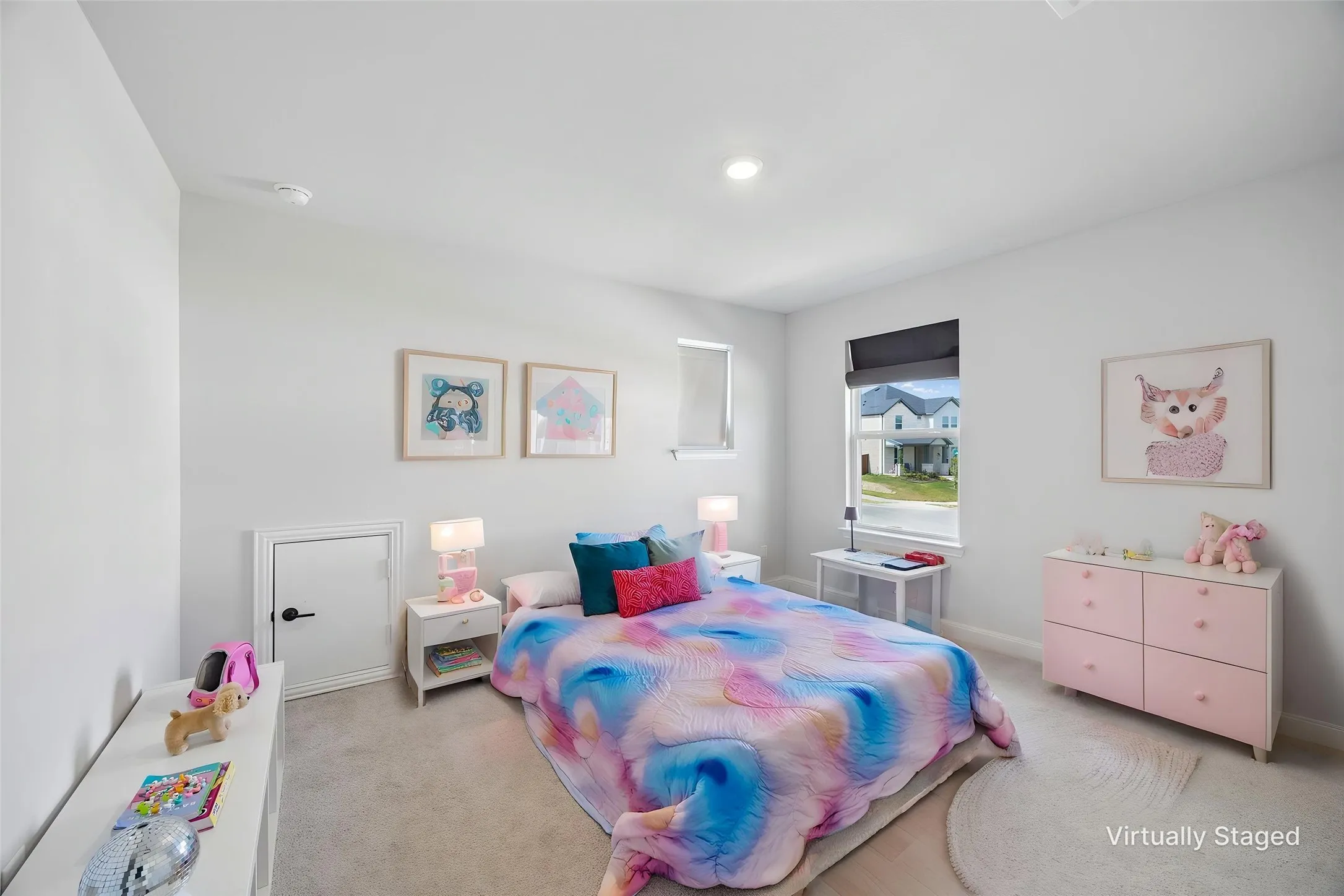 Recessed lighting, wall-to-wall carpeting, and a window with roller shade