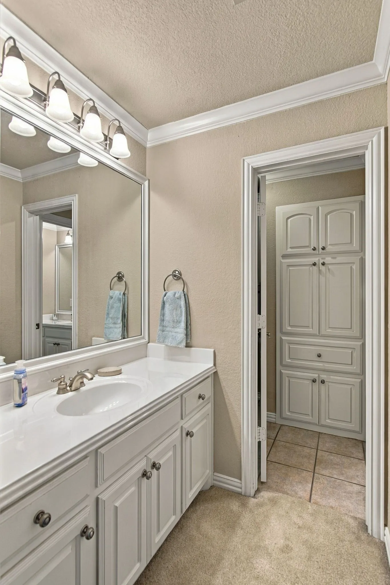 Upstairs adjoining bathroom.