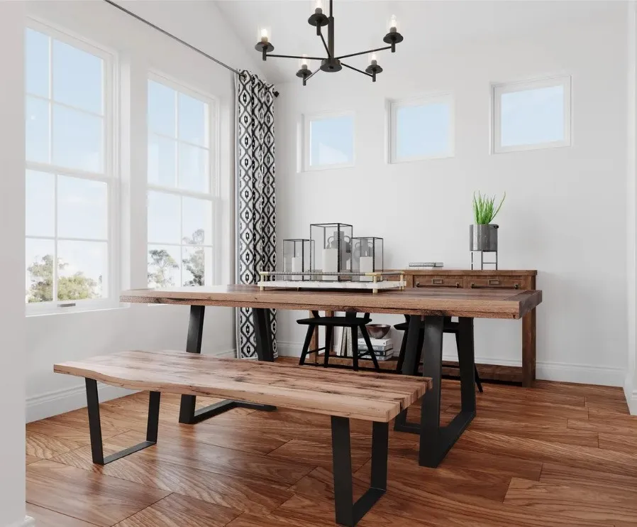 Vaulted ceiling, multiple large windows, wood-finish flooring, and a modern chandelier