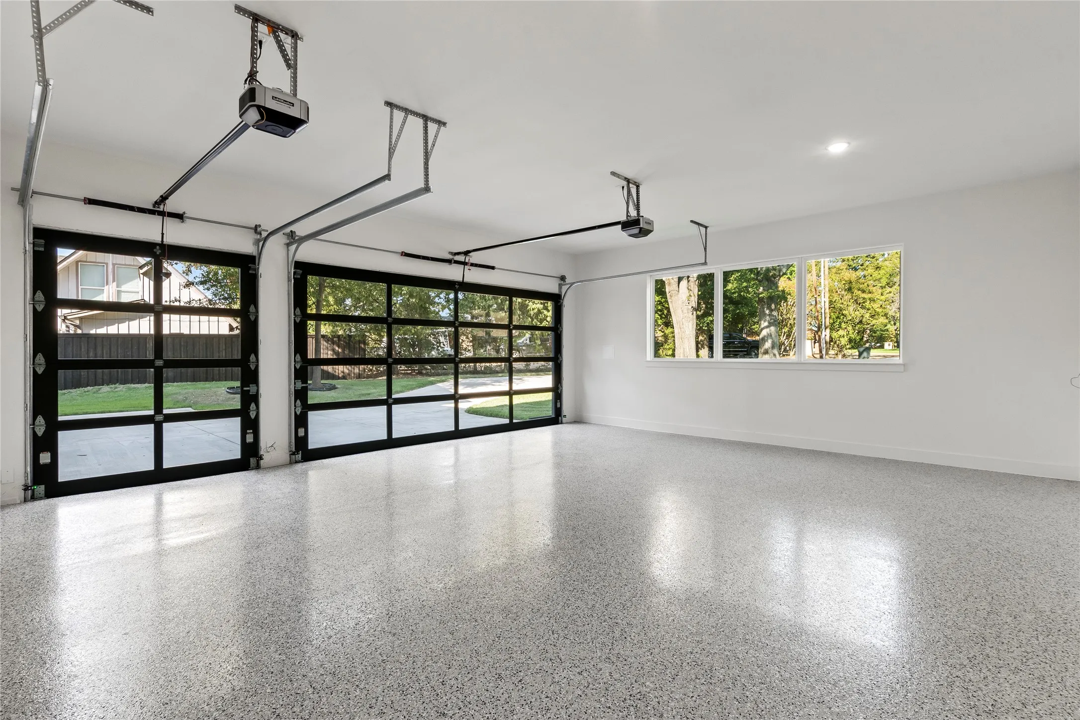 Three car garage with epoxy flooring