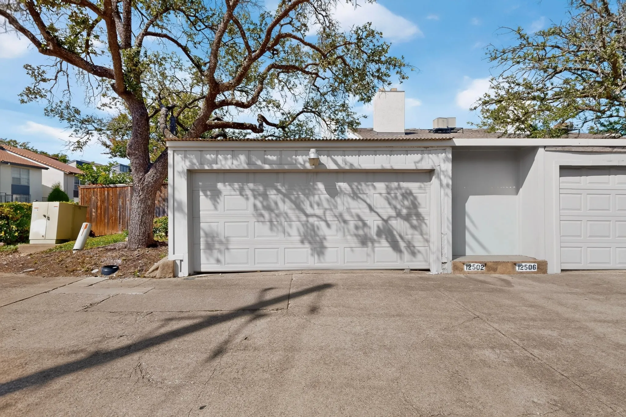 White garage door with panel detailing