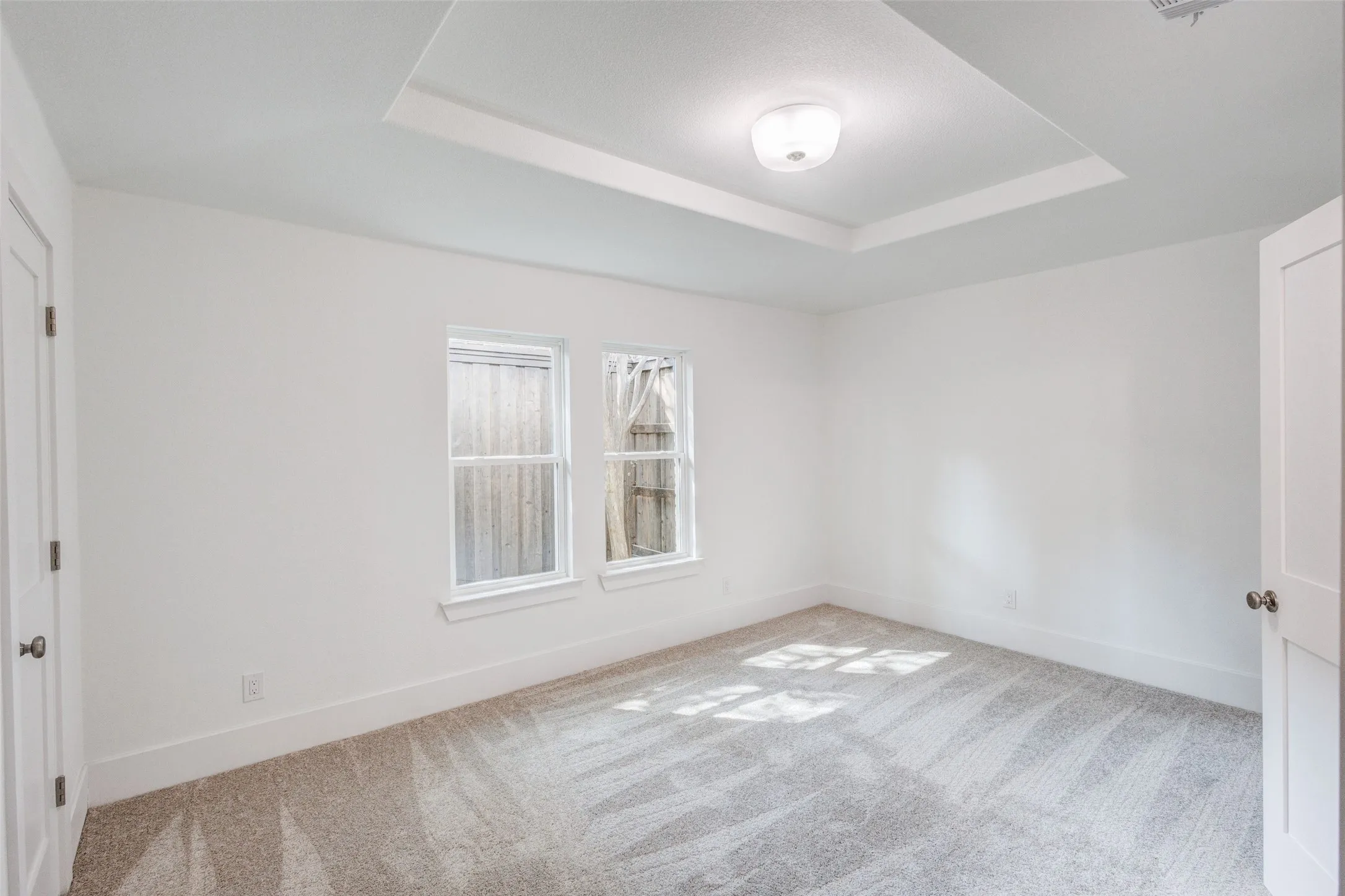 Tray ceiling with flush mount lighting