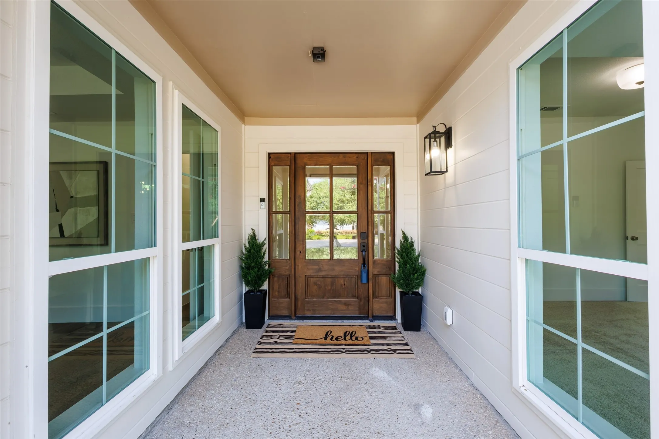 Wood-finish entry door with clear glass panels