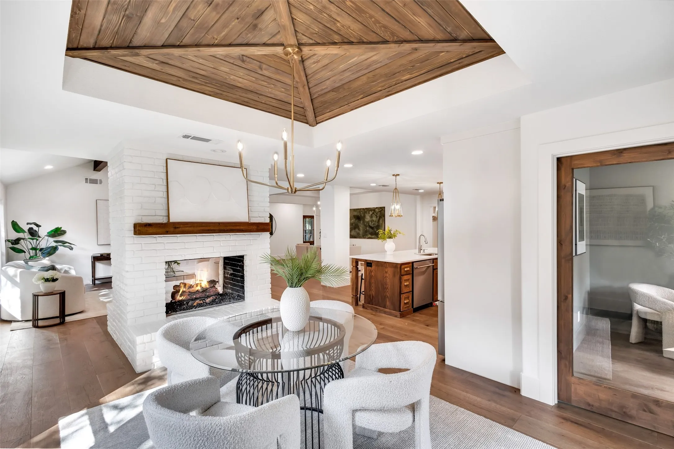 Wood-finish coffered ceiling with a chandelier
