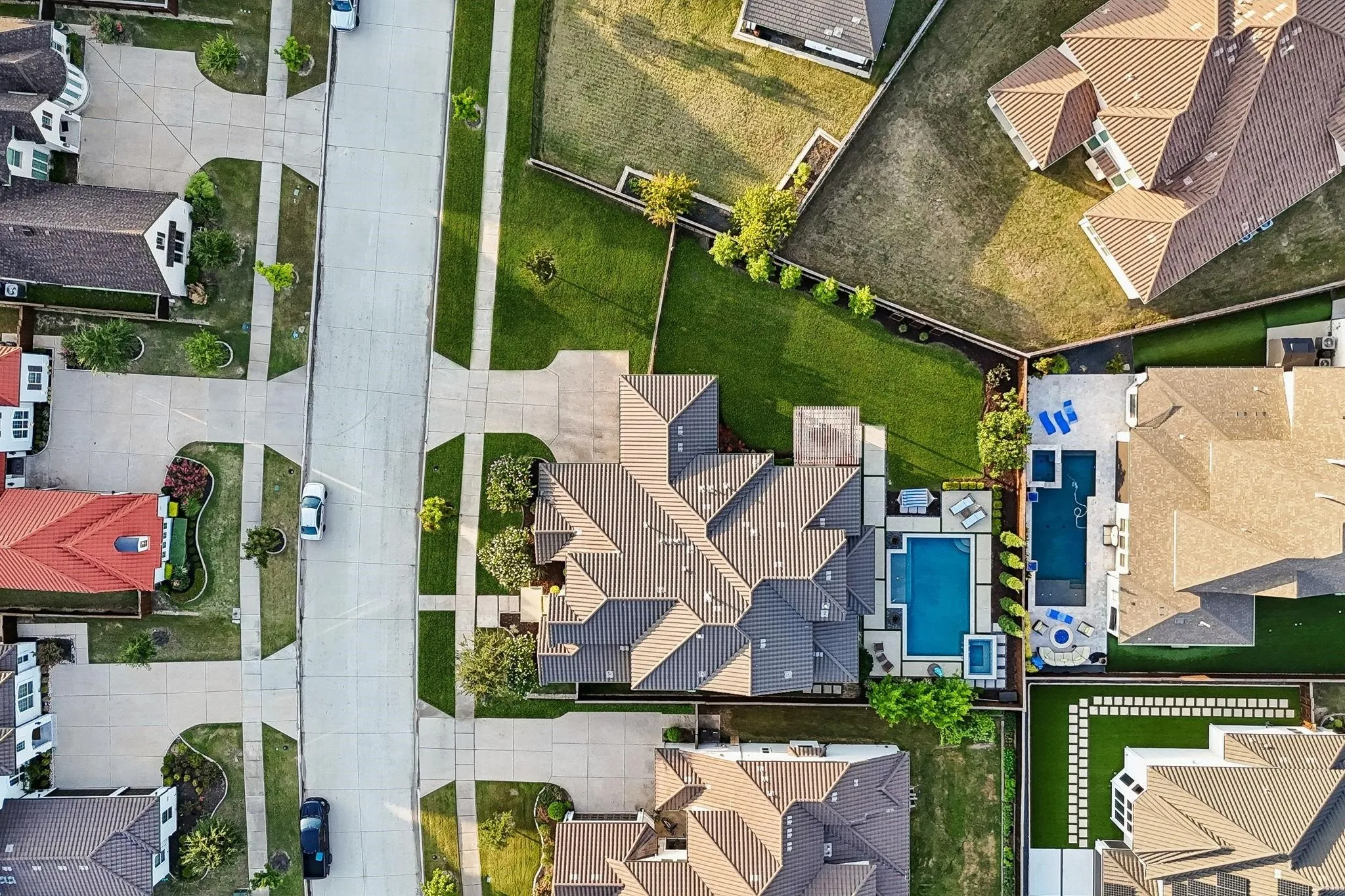 Bird's-eye view highlights the incredible backyard layout and spacious side yard with room to play and entertain.