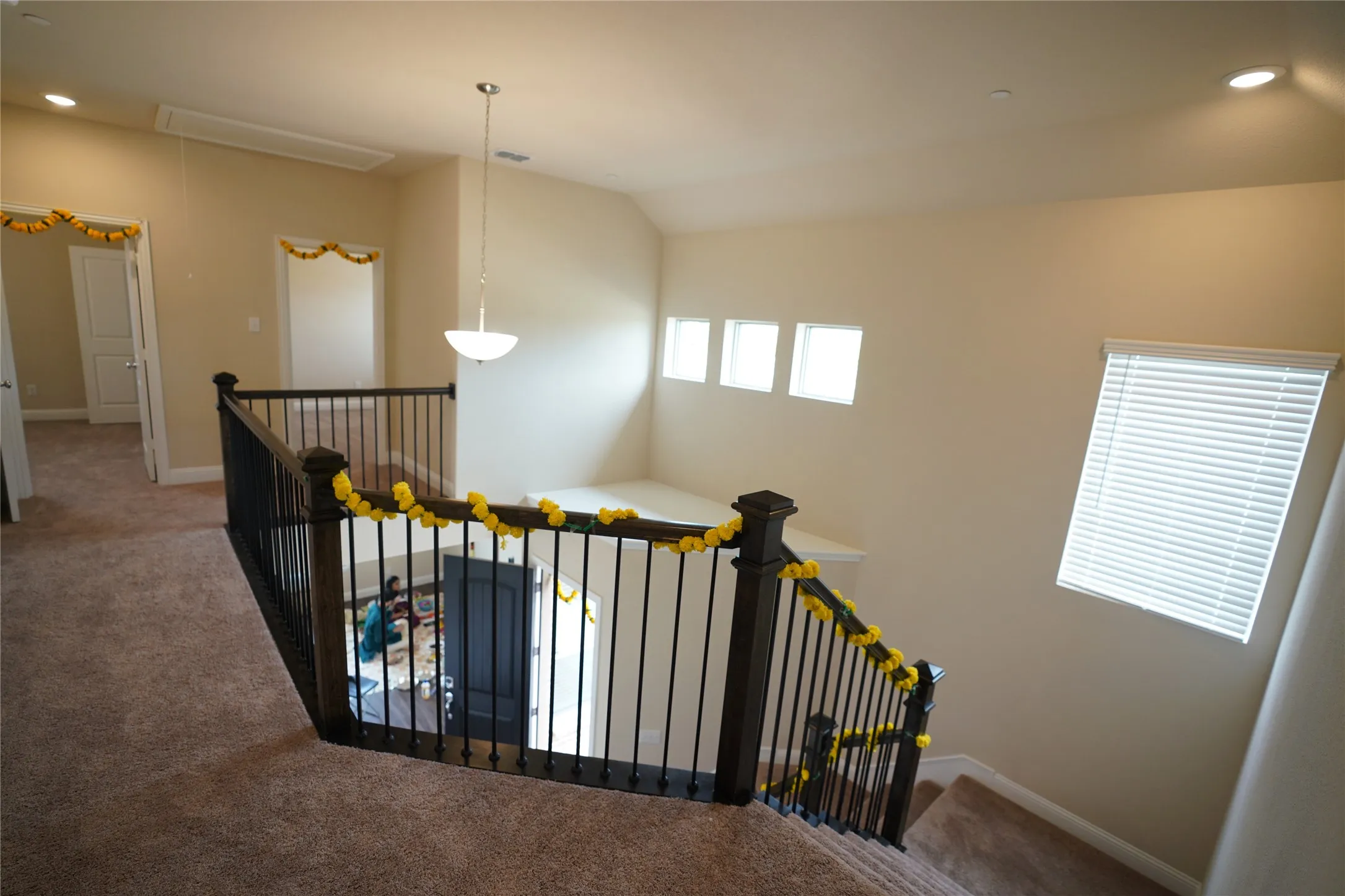 Staircase with attic access, recessed lighting, carpet, and lofted ceiling