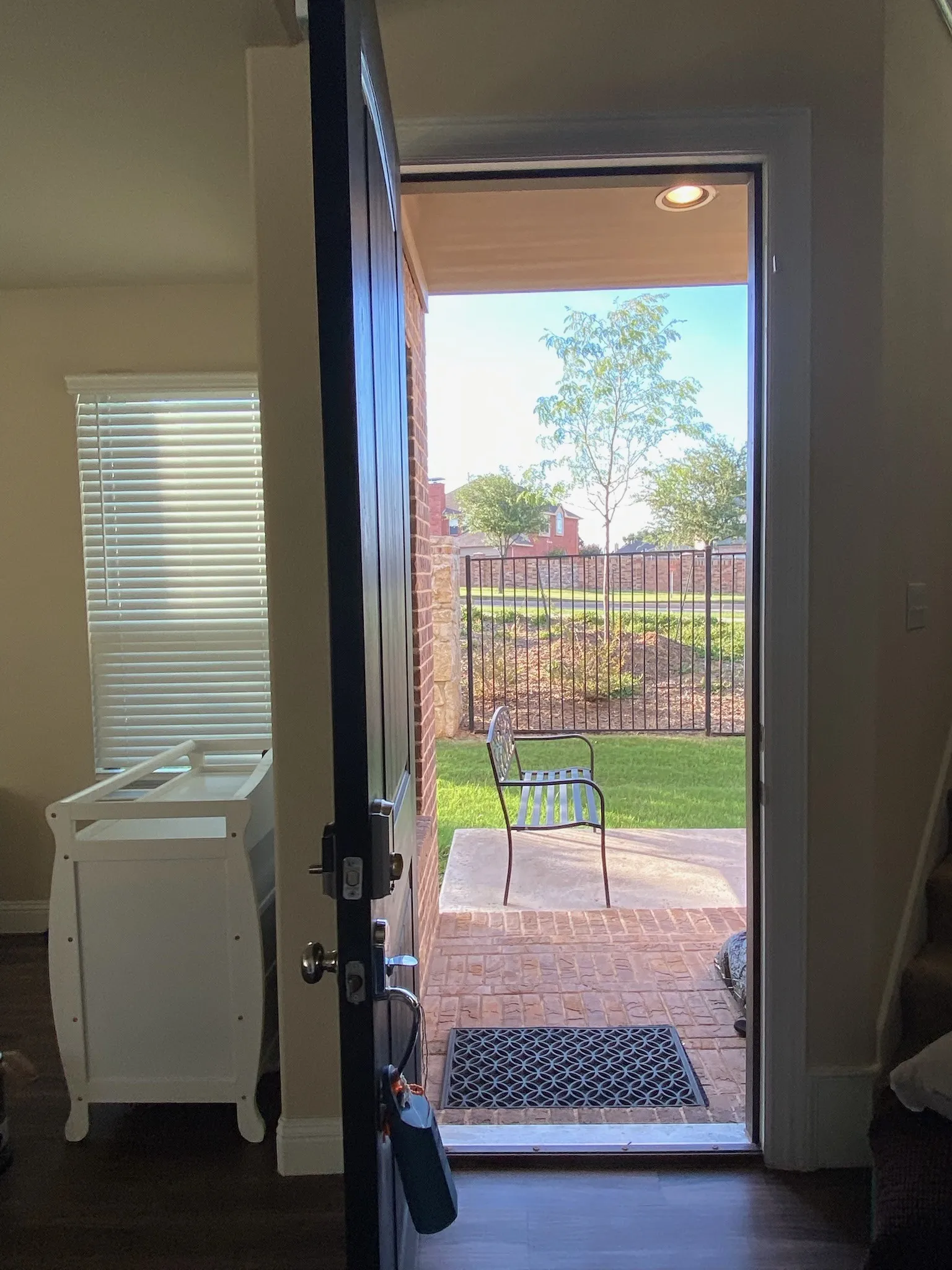 Doorway with wood finished floors