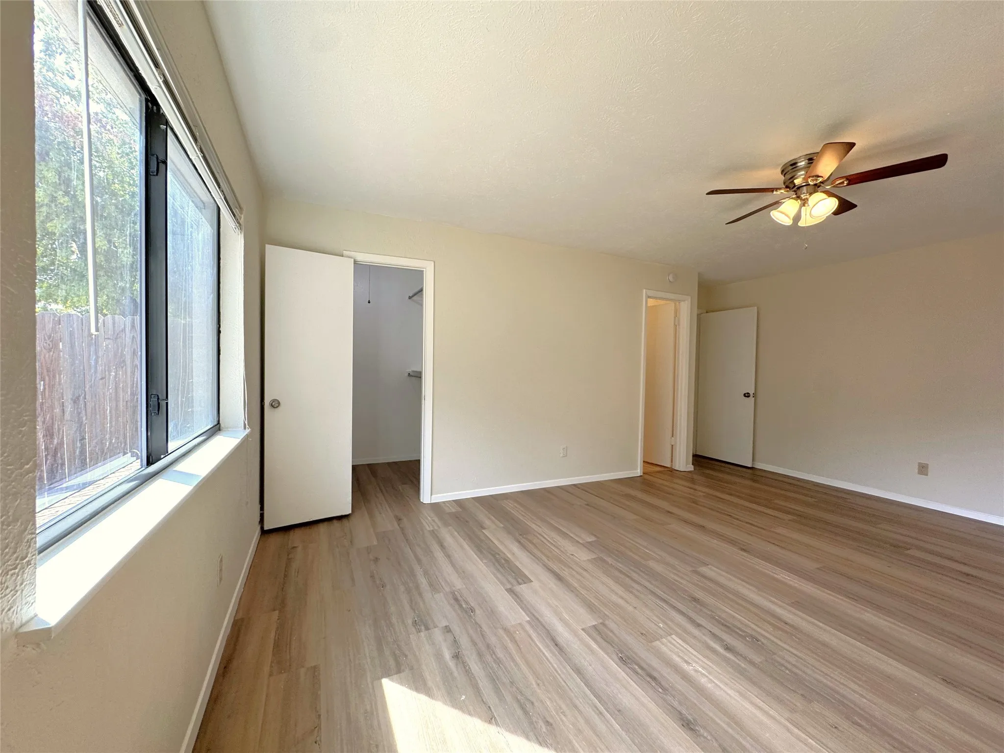 Primary bedroom has a walk-in closet