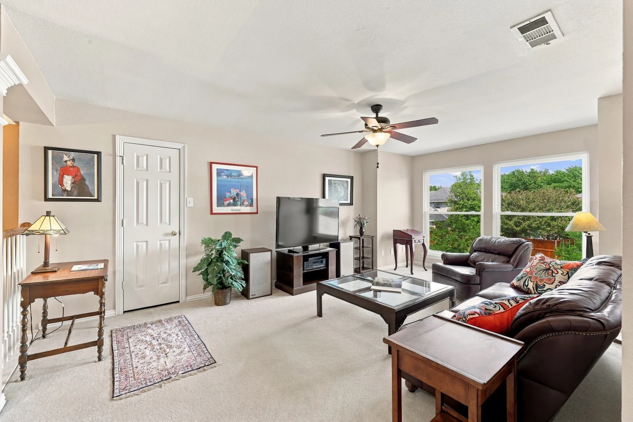 Upstairs gameroom with beautiful windows overlooking backyard.