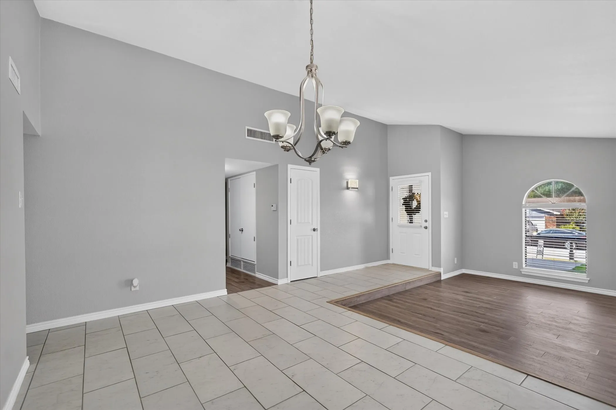 Living space flows openly into the dinning area with natural light continuing throughout