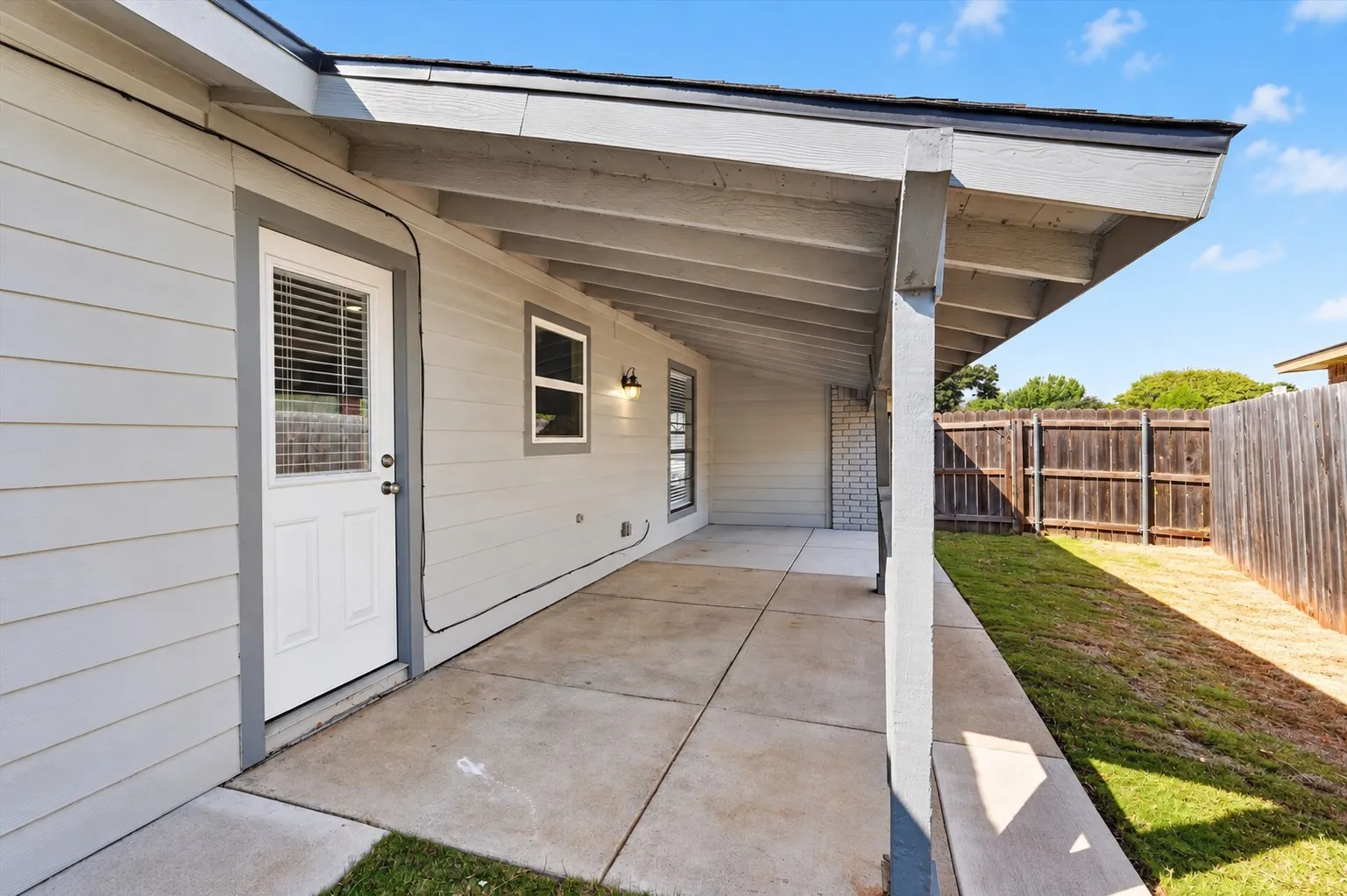 A great covered patio off of the main living area and kitchen