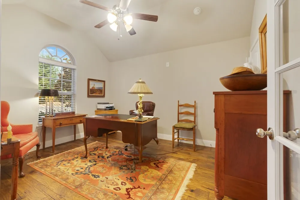 A French door leads into the 3rd bedroom with 2 closets, currently used as an office.