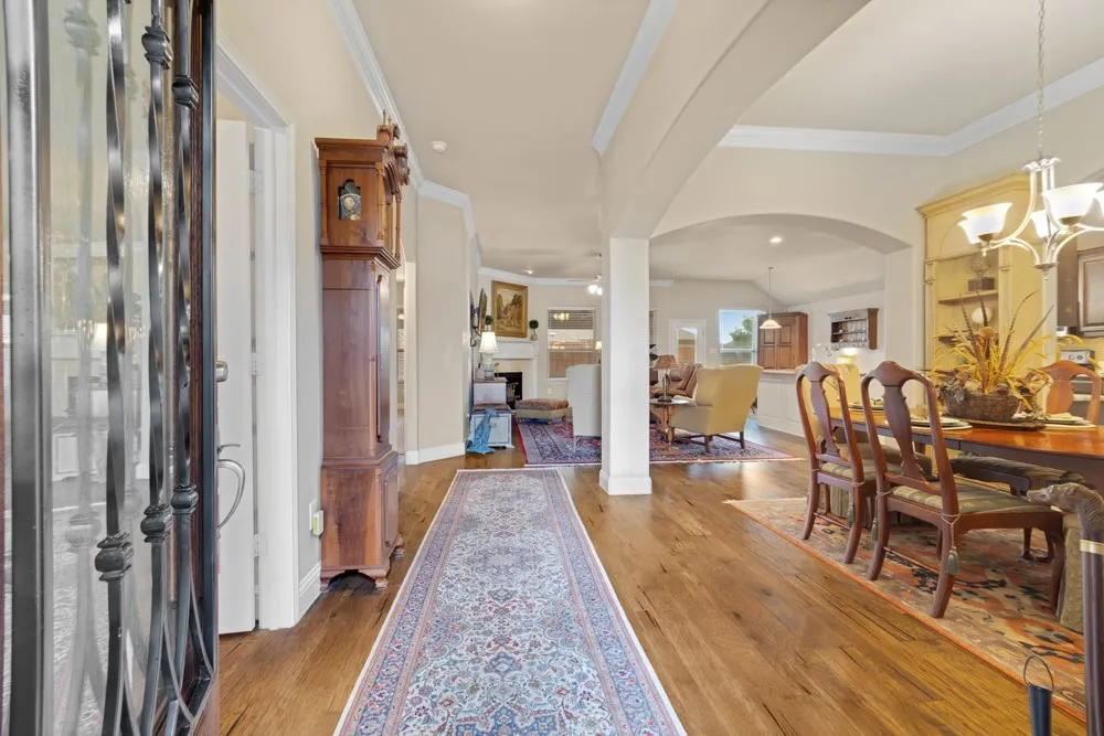 Upon entry, you'll be greeted by an open floor plan filled with custom features.