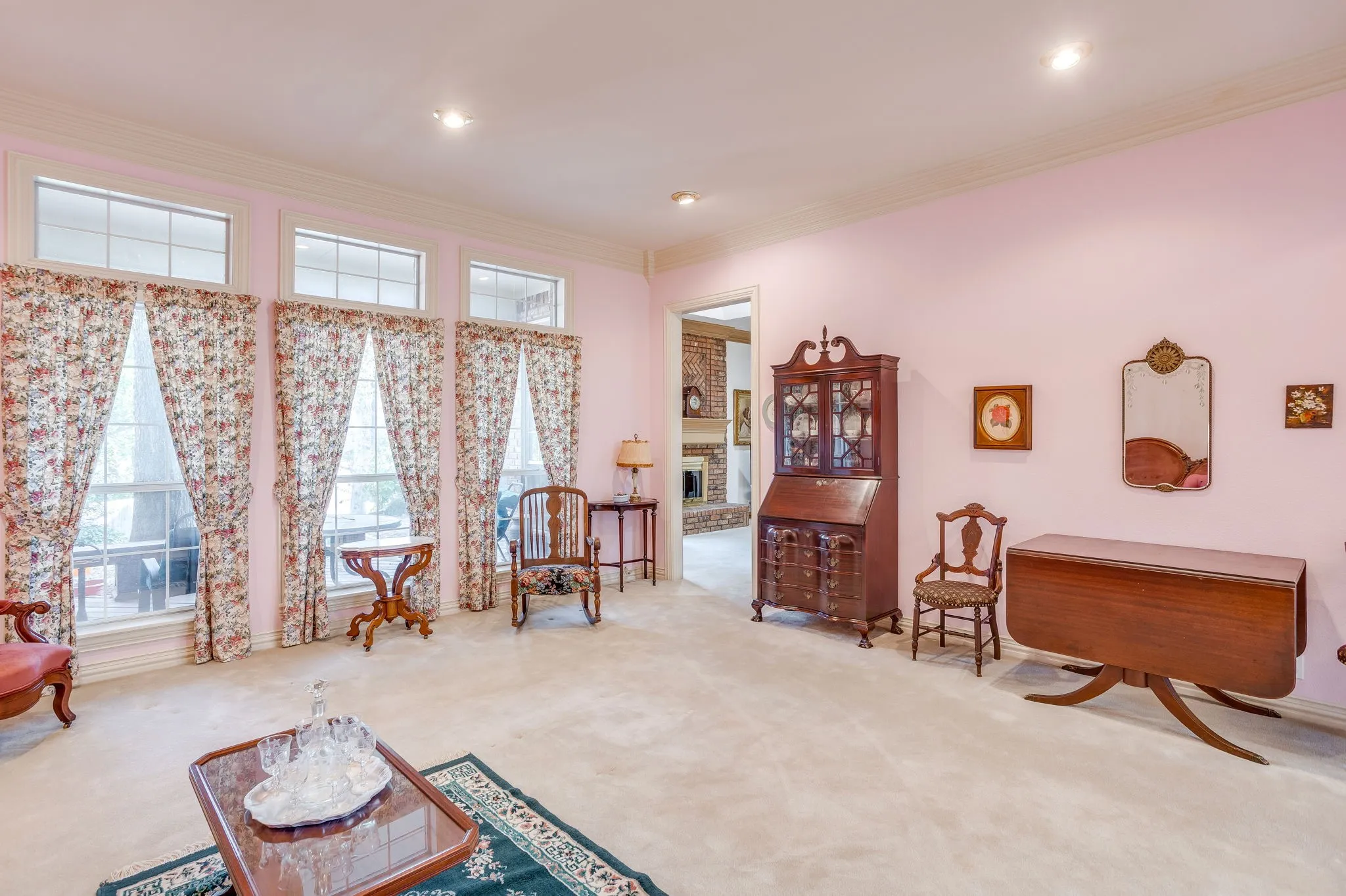 Recessed ceiling lighting illuminates the space