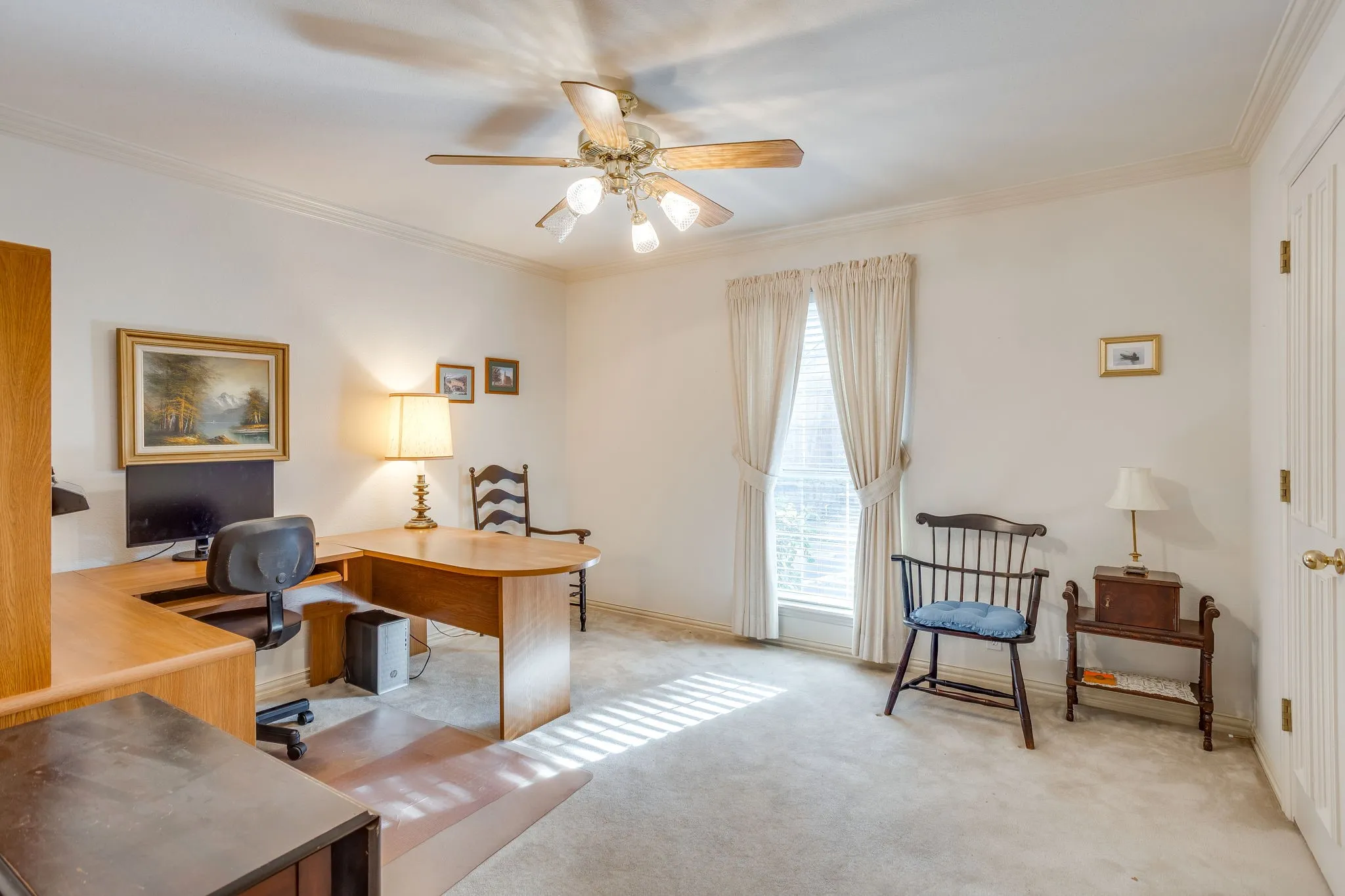 Crown molding and carpeted flooring