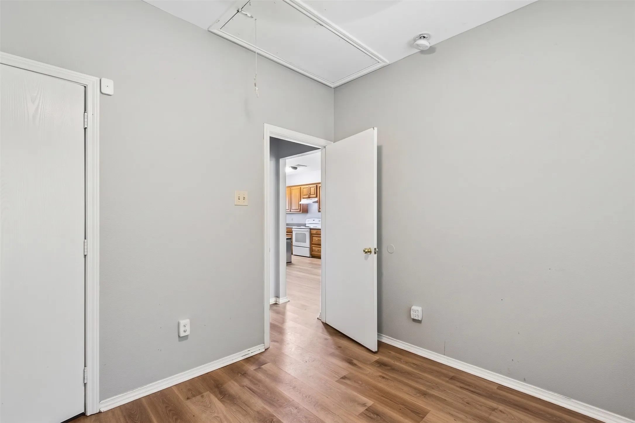 Bedroom 2 pairs neutral finishes with a ceiling fan and closet for everyday comfort and function. | 5959 Robinwood