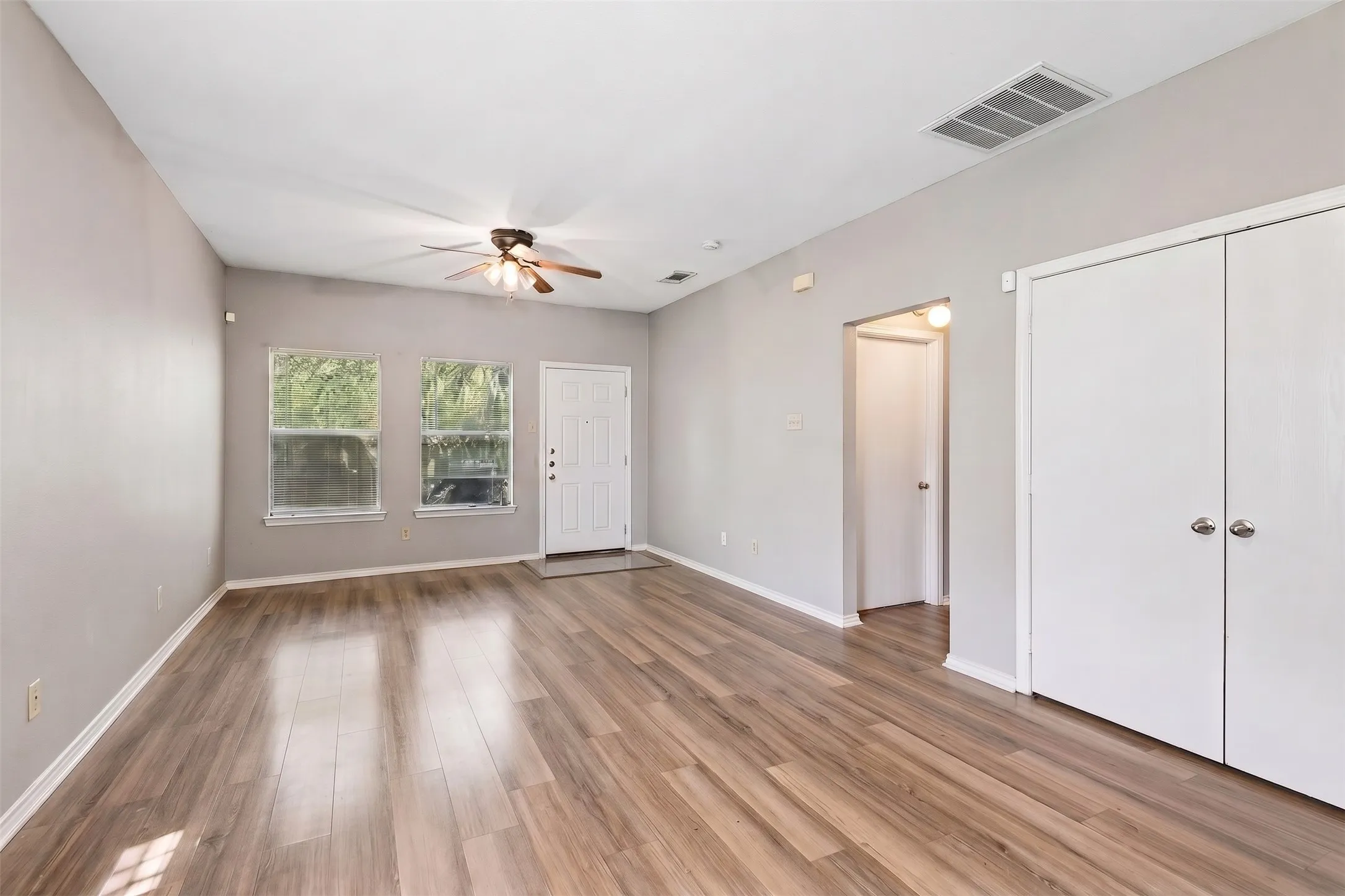 An open view of the living and dining spaces. | 5959 Robinwood