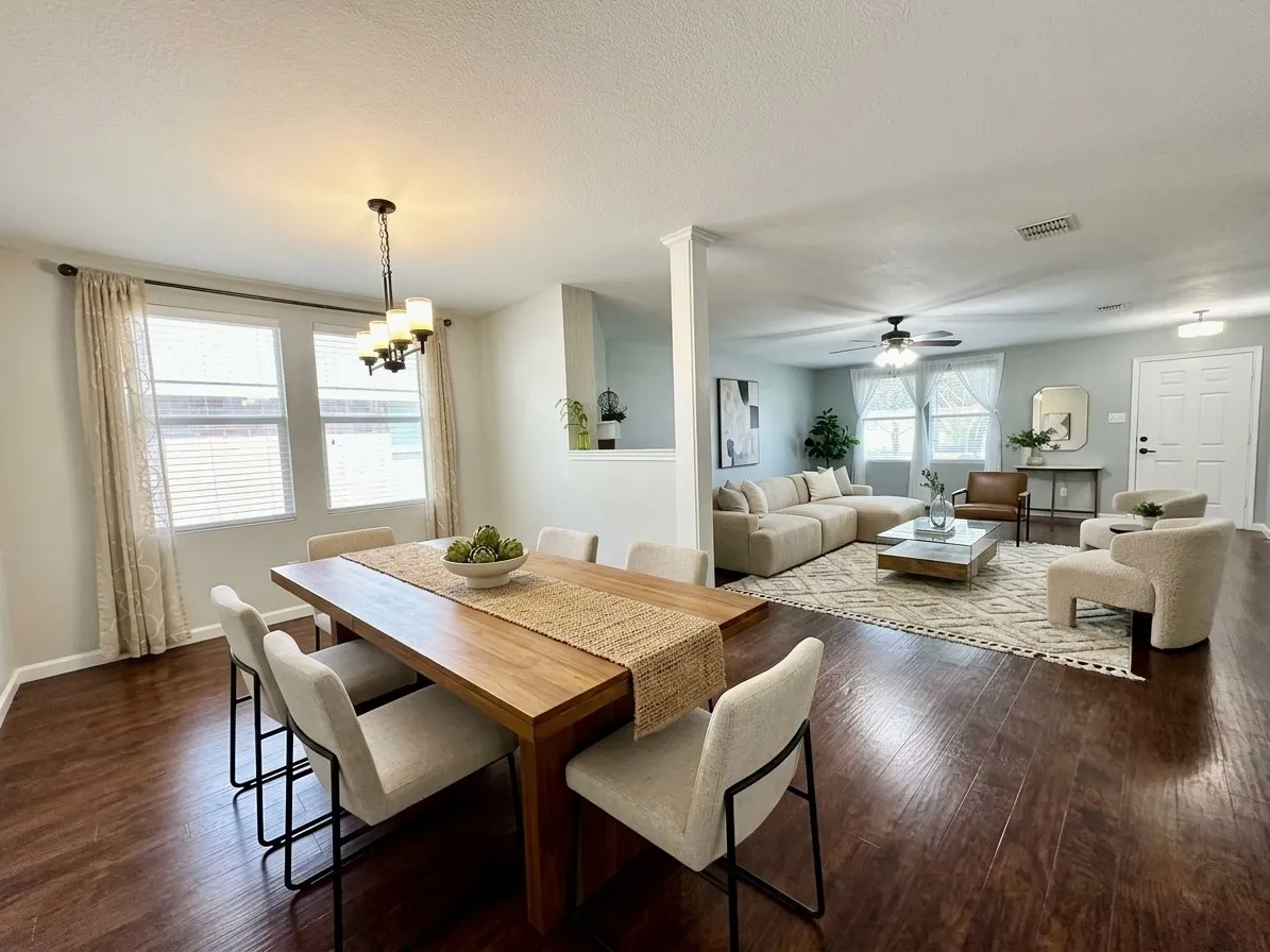 Wood-finish flooring extends throughout the dining area and living space,virtal staged