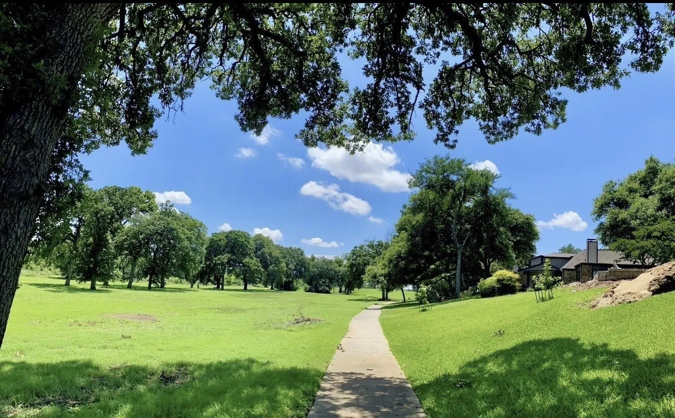 Freshly paved walking paths throughout the former golf course