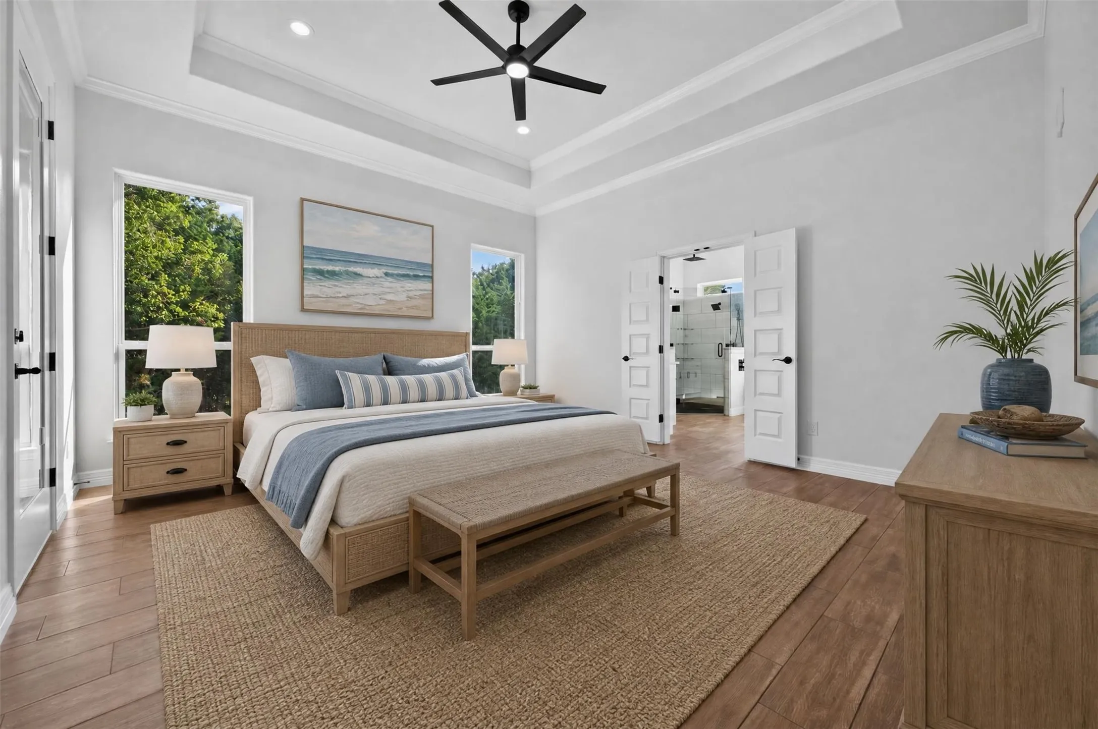Virtually staged to showcase the generous size and furniture possibilities of the primary suite.  *Furniture and decor are digitally rendered.*