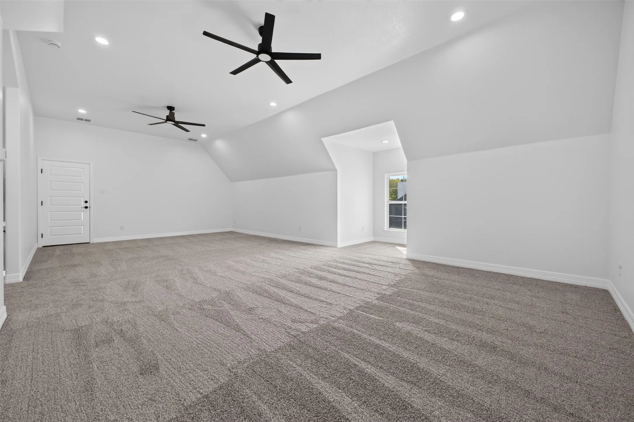 Expansive flex space above the garage offers endless possibilities for a game room, media room, home gym, or additional living space.