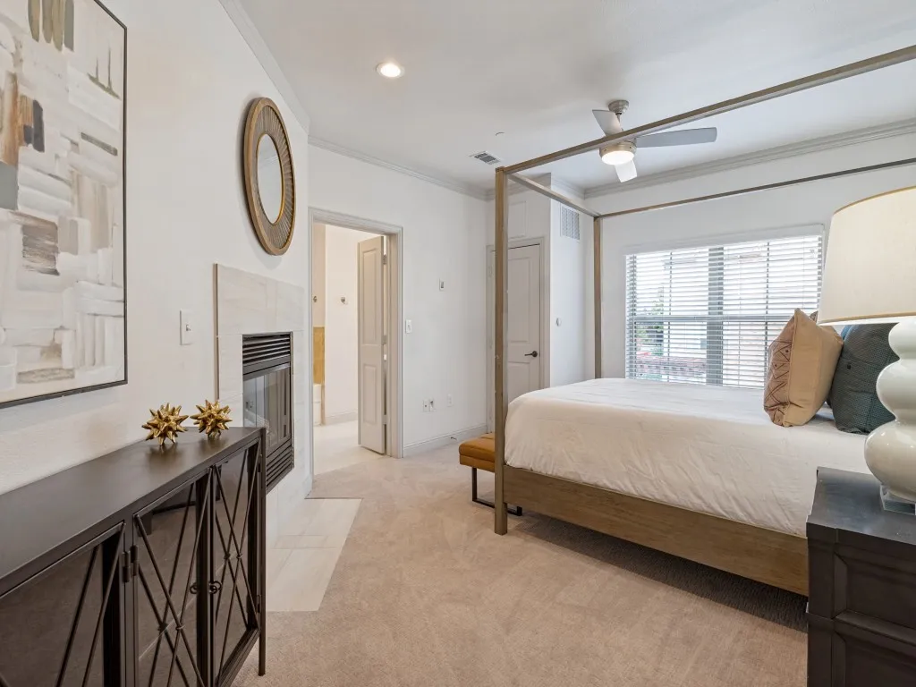 Primary Bedroom with fireplace.