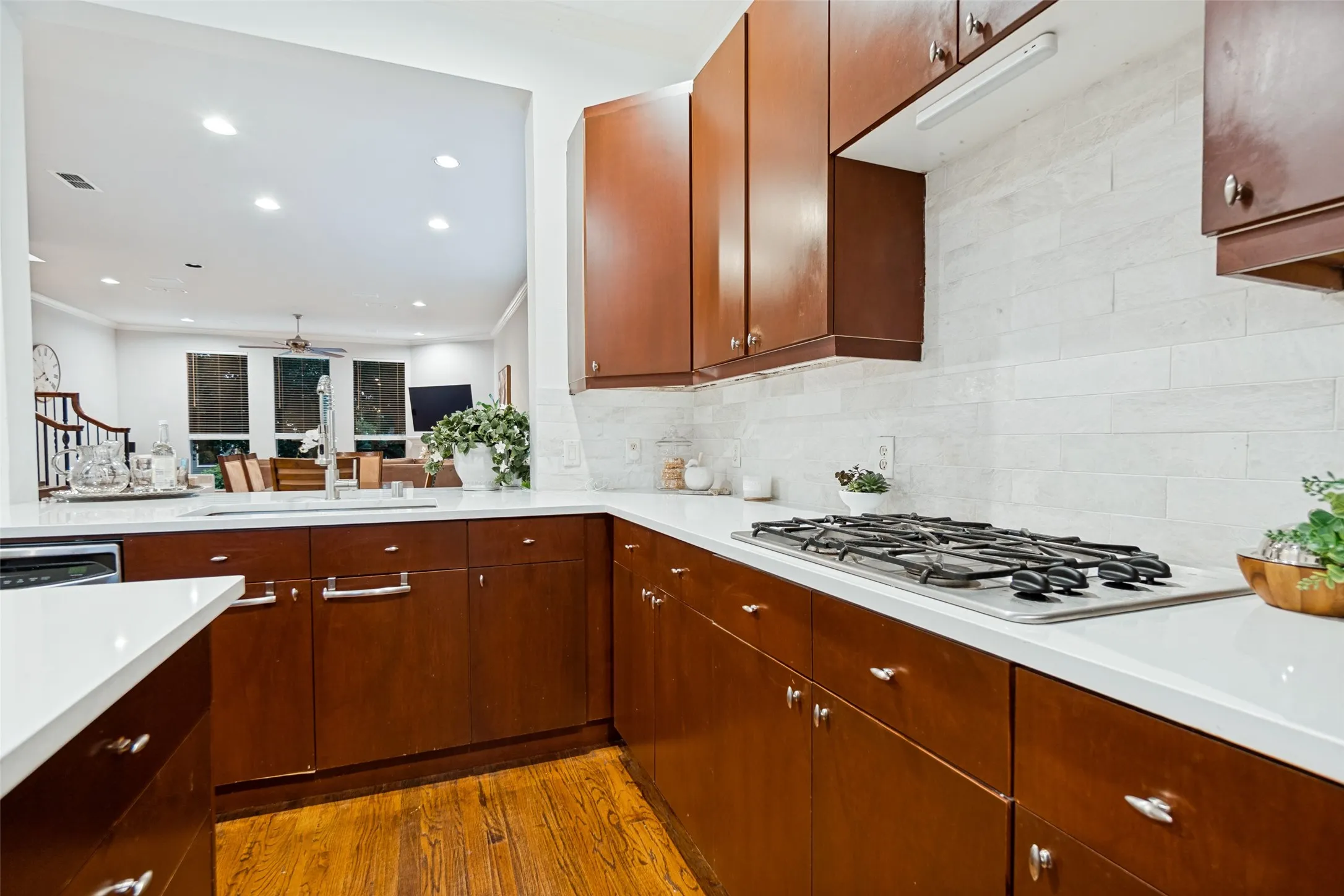 Cooks kitchen with gas cooktop, new countertops and backsplash